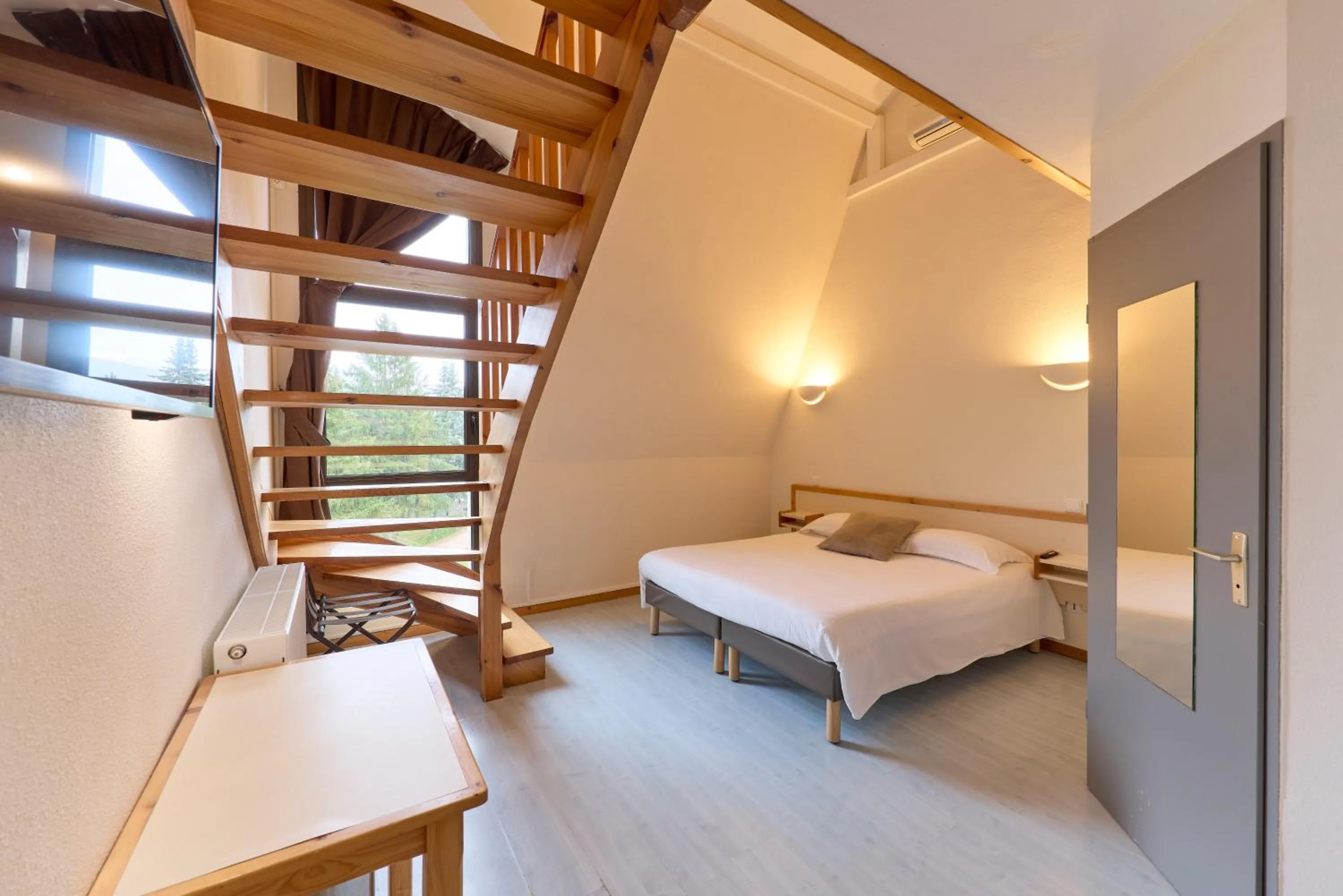 Bedroom, Bed in Hôtel-Restaurant Le Calice Du Gevaudan - A75