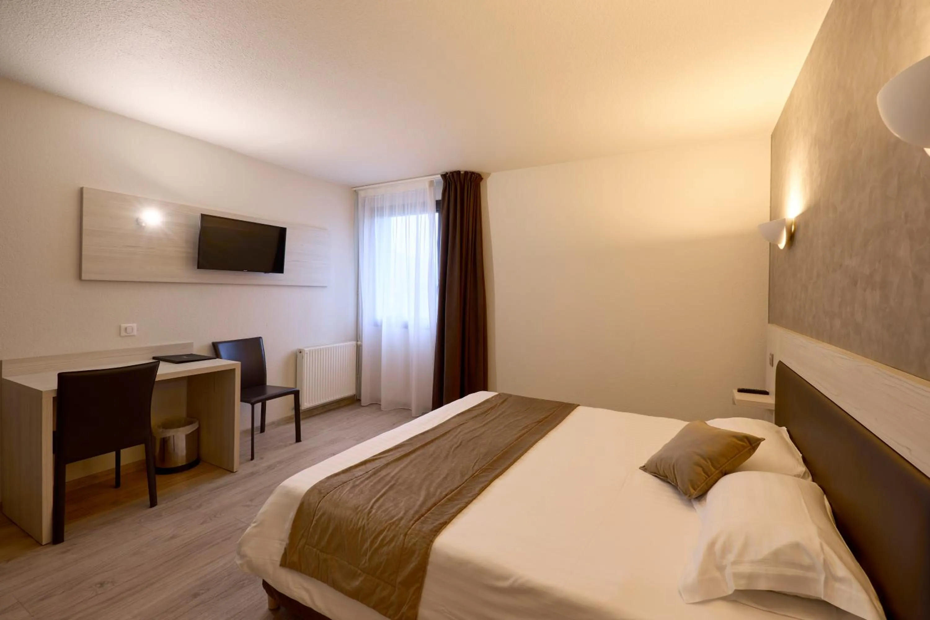 Bedroom, Bed in Hôtel-Restaurant Le Calice Du Gevaudan - A75