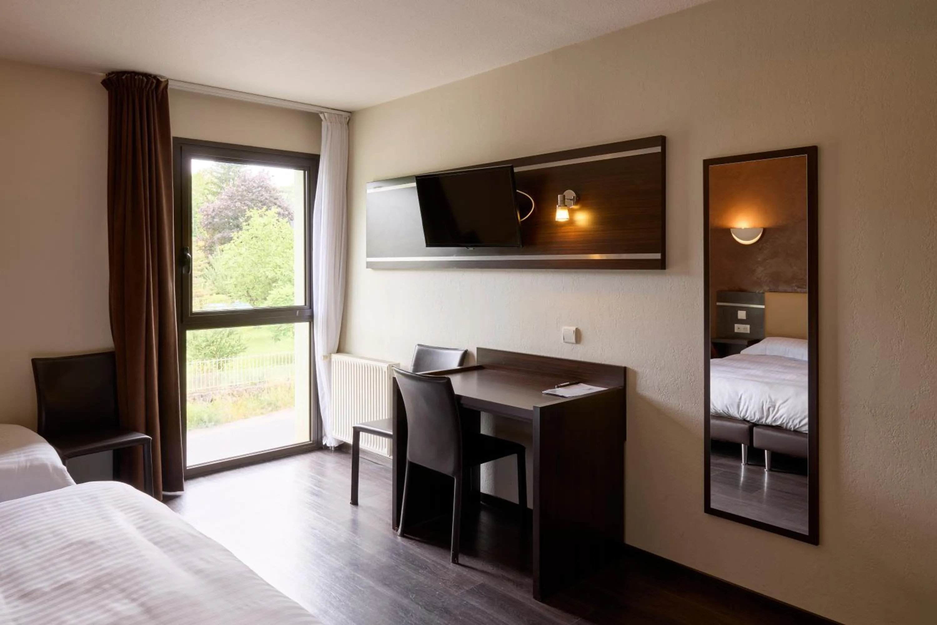 Bedroom, Bed in Hôtel-Restaurant Le Calice Du Gevaudan - A75