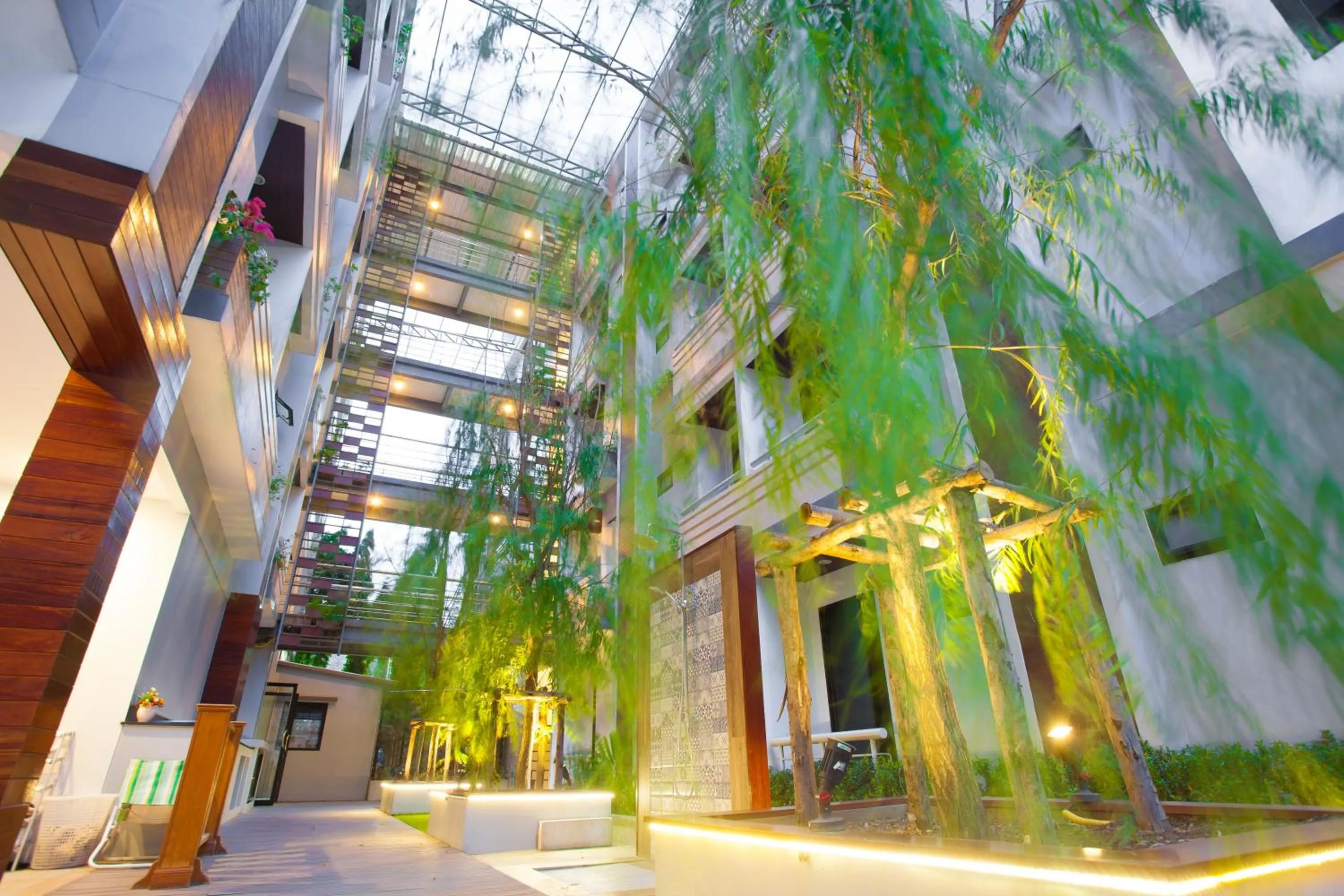 Property building in New Siam Palace Ville Hotel