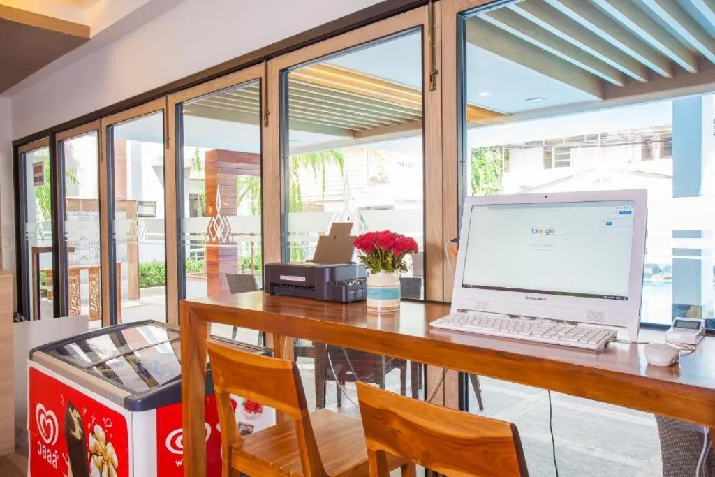 Property building in New Siam Palace Ville Hotel