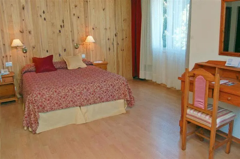Bed in Ruca Cheli Village Ski Hotel