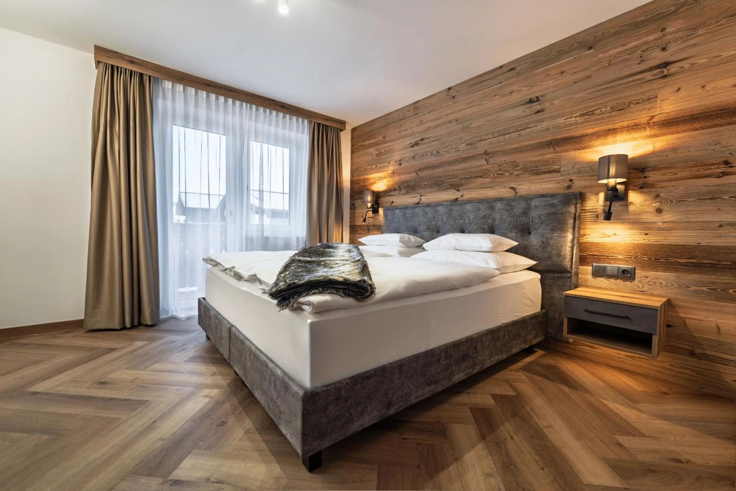 Bed in Hotel Vier Jahreszeiten