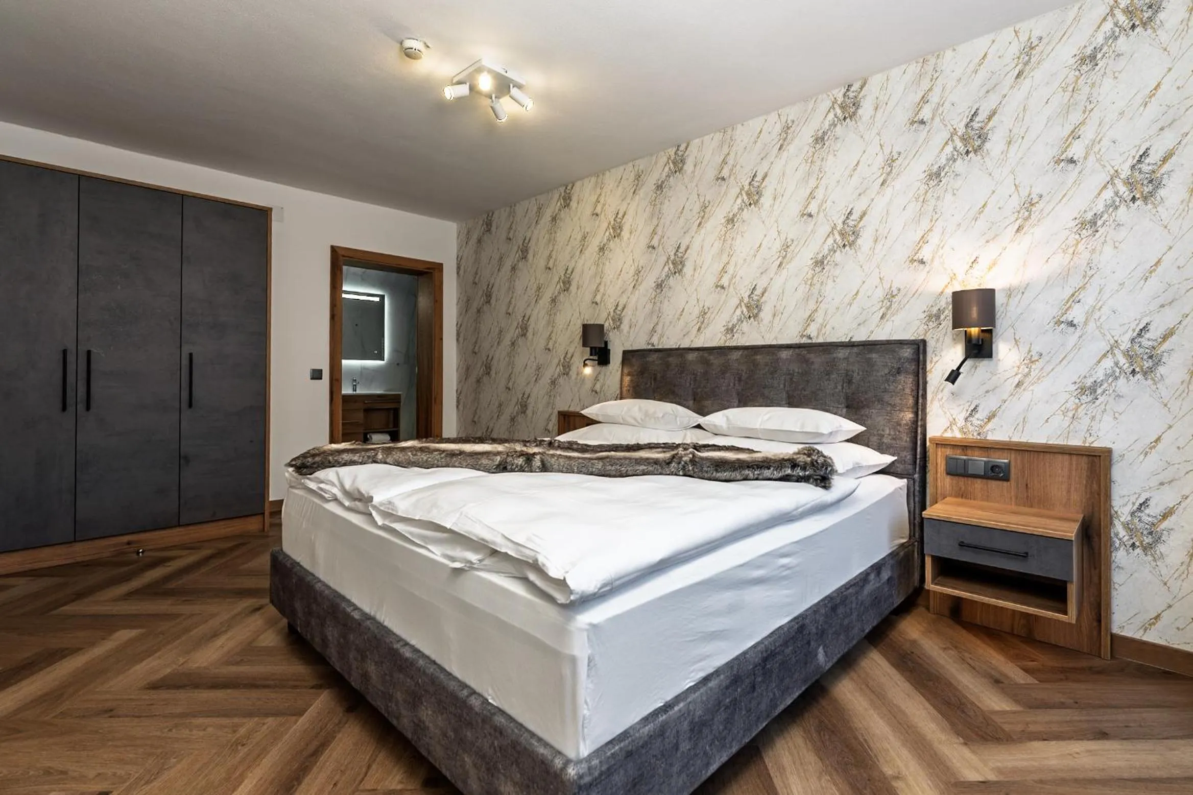 Bed in Hotel Vier Jahreszeiten