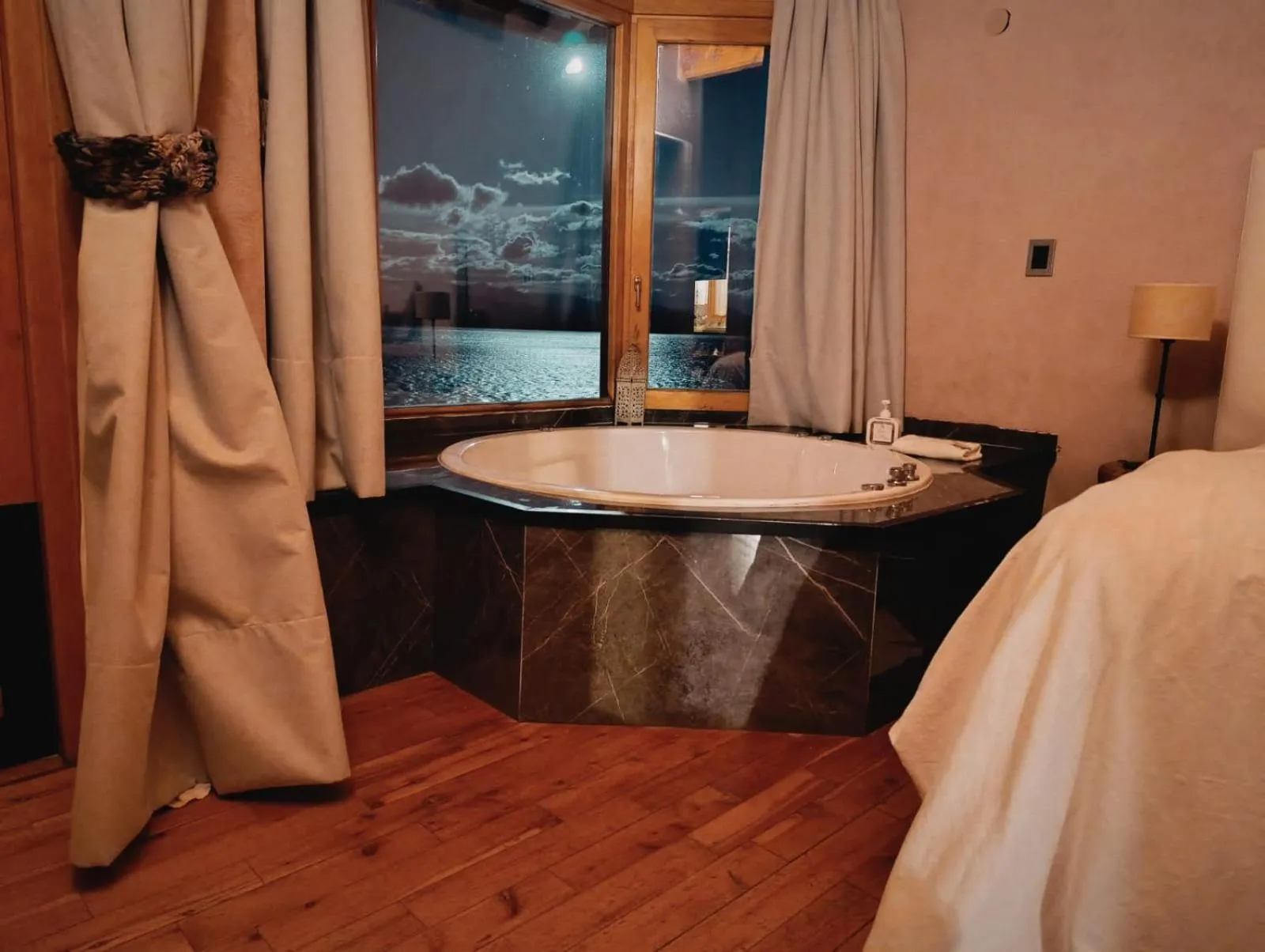 Bed in Lirolay Suites - Apart Hotel