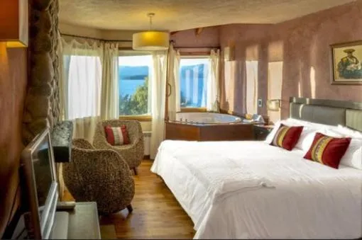 Bed in Lirolay Suites - Apart Hotel