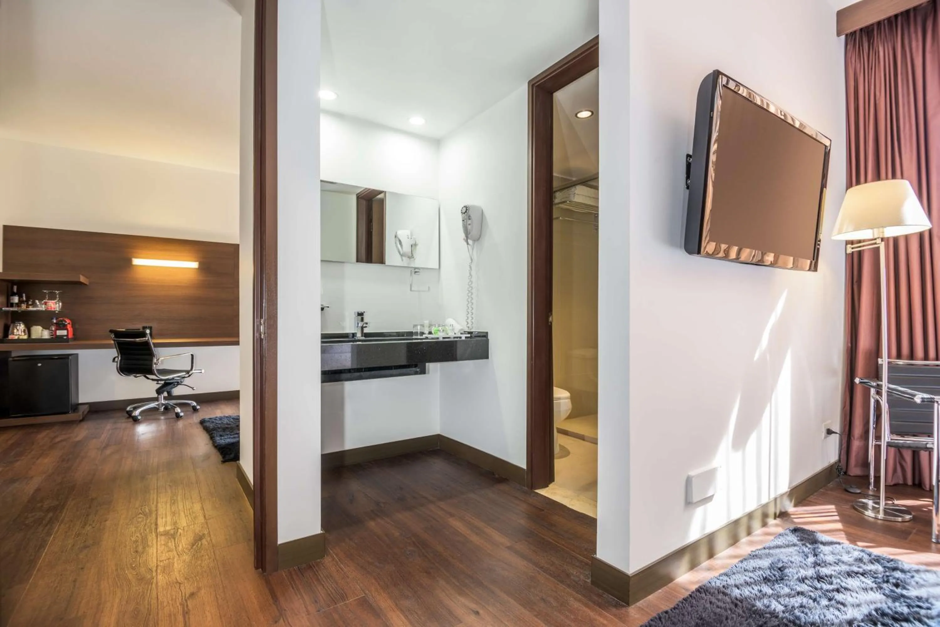 Photo of the whole room in NH Collection Bogota Andino Royal