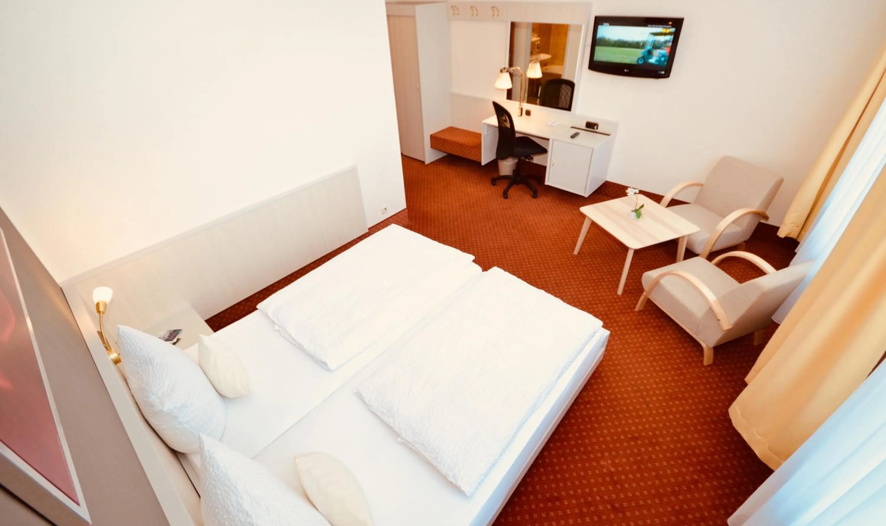 Photo of the whole room, Bed in CityHotel Uelzen