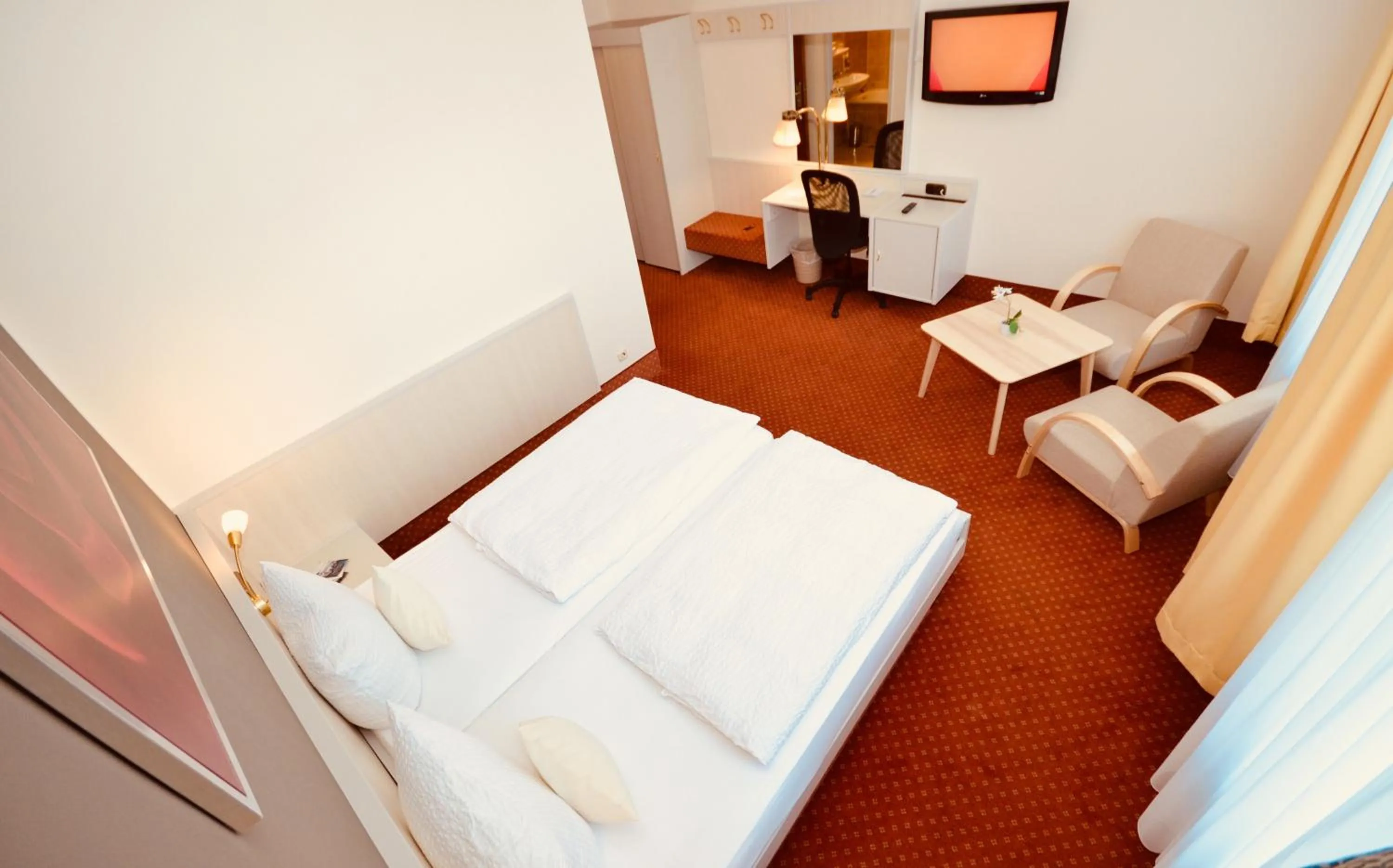 Photo of the whole room, Bed in CityHotel Uelzen