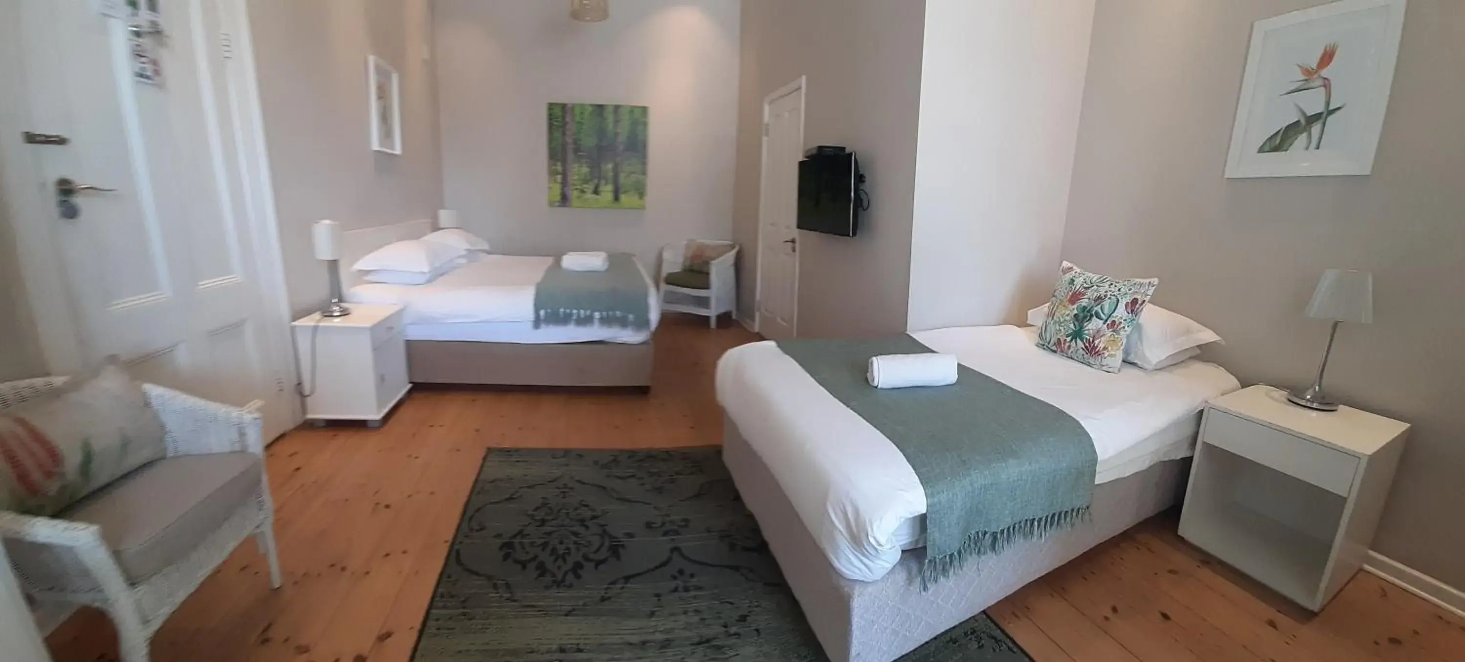 Triple Room with Shower in The Greenhouse Guesthouse Triple Room with Shower in The Greenhouse Guesthouse