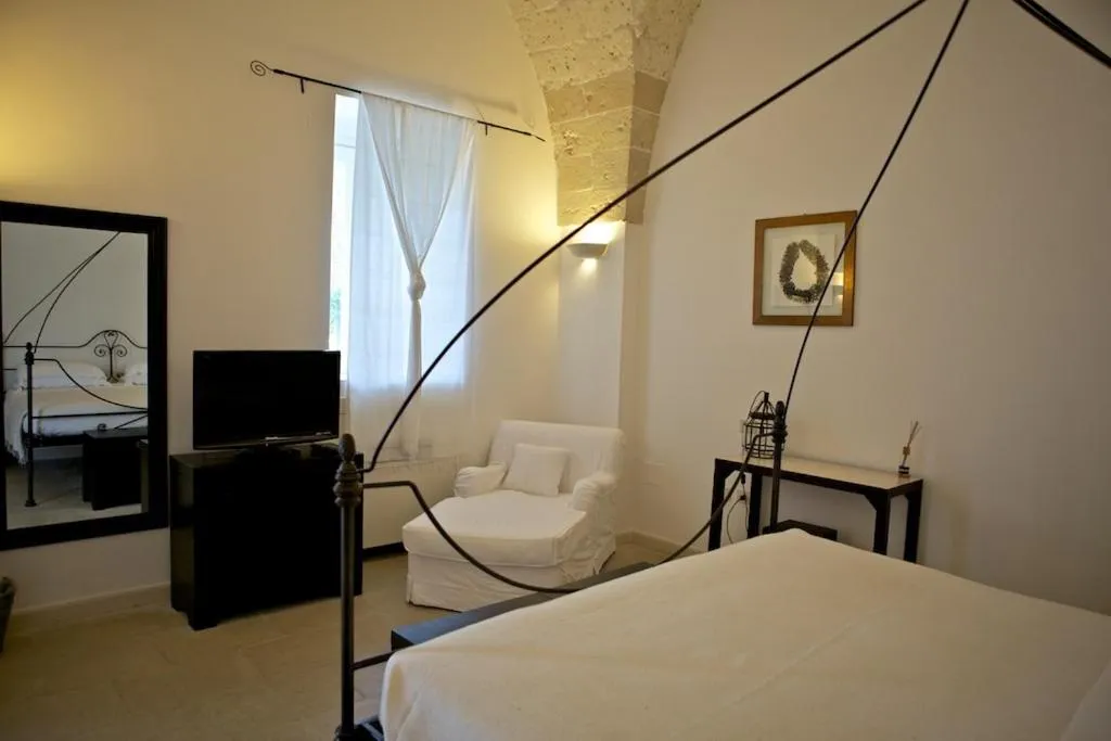 Photo of the whole room, Bed in Masseria Montelauro