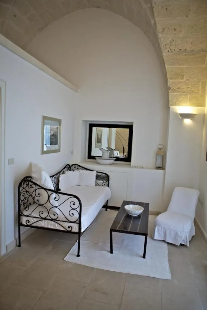Photo of the whole room, Bed in Masseria Montelauro