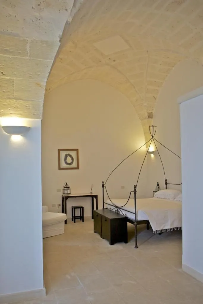 Photo of the whole room, Bed in Masseria Montelauro