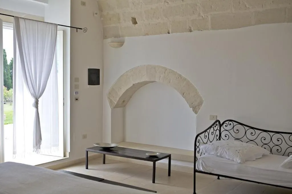 Photo of the whole room, Bed in Masseria Montelauro