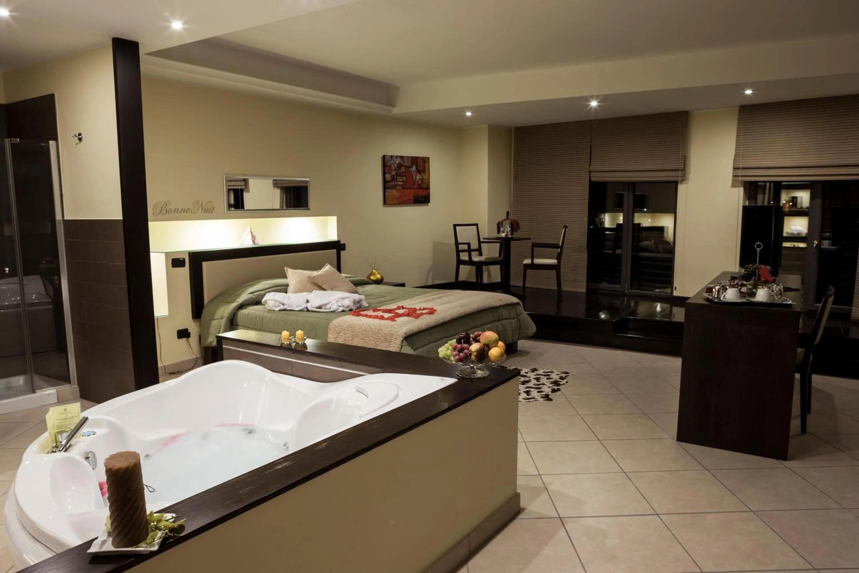 Bed in Manhattan Village Hotel