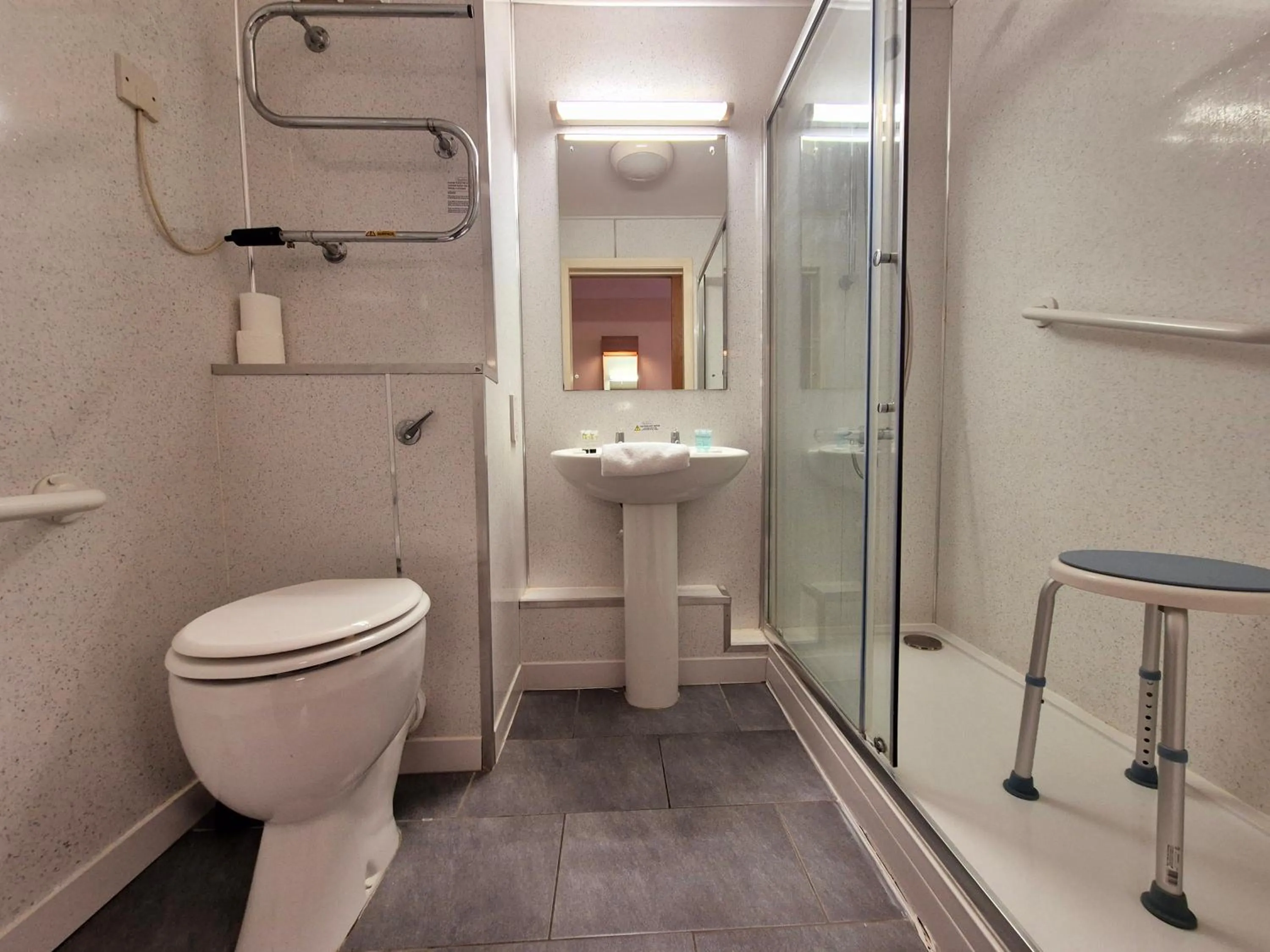 Toilet in Supreme Inn Boston