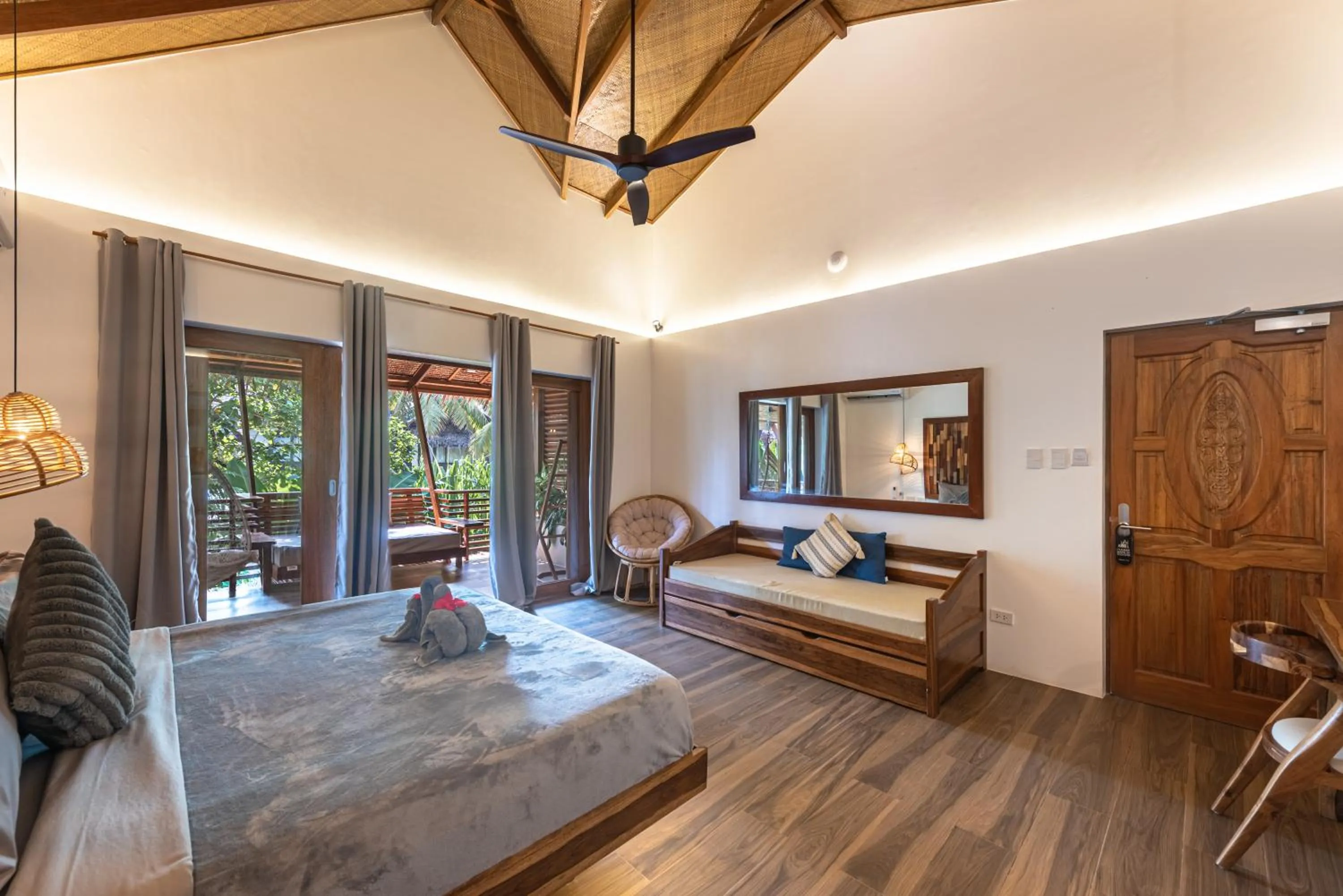 Bed in Siargao Island Villas