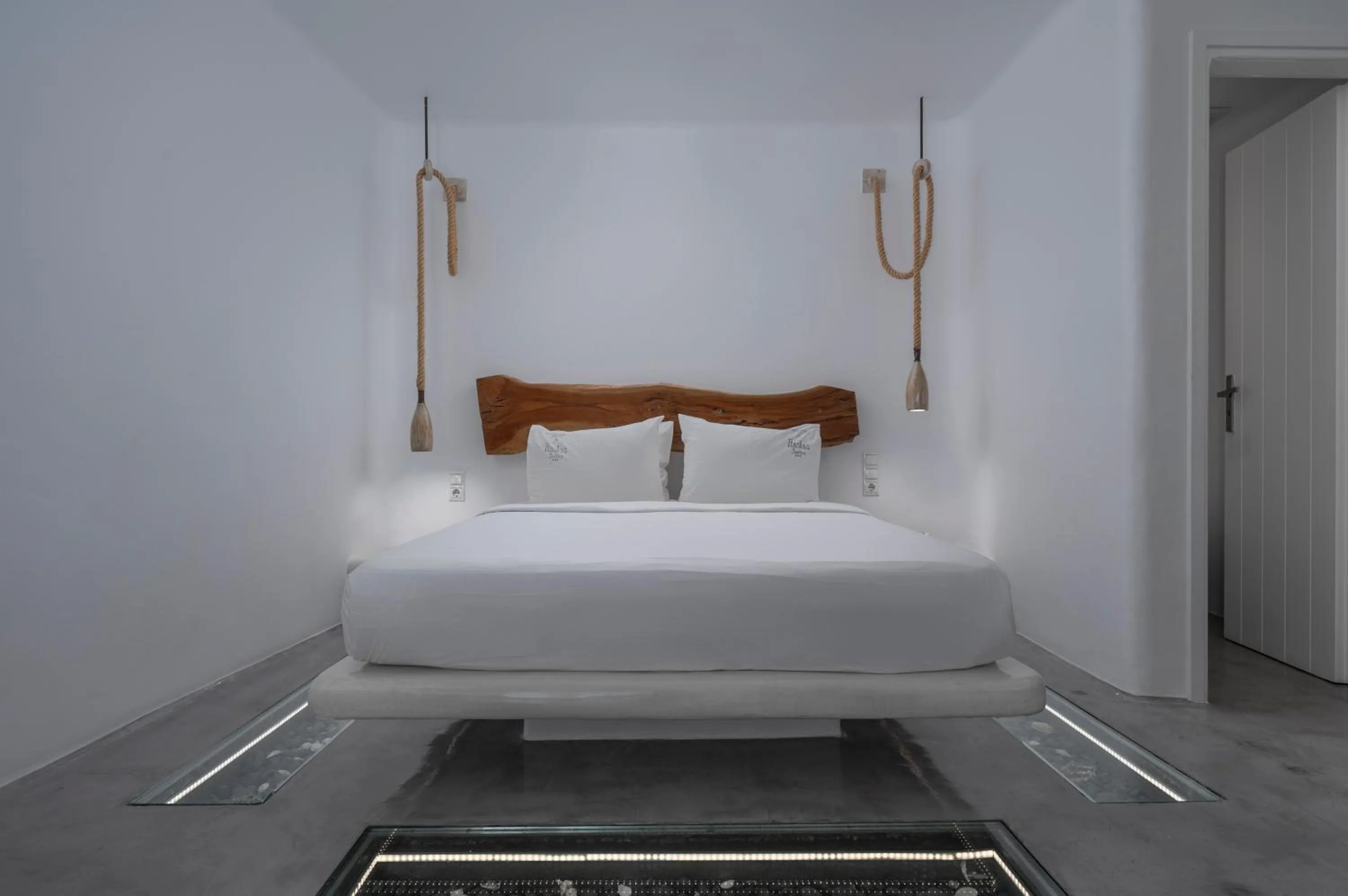 Bed in Flaskos Luxury Suites