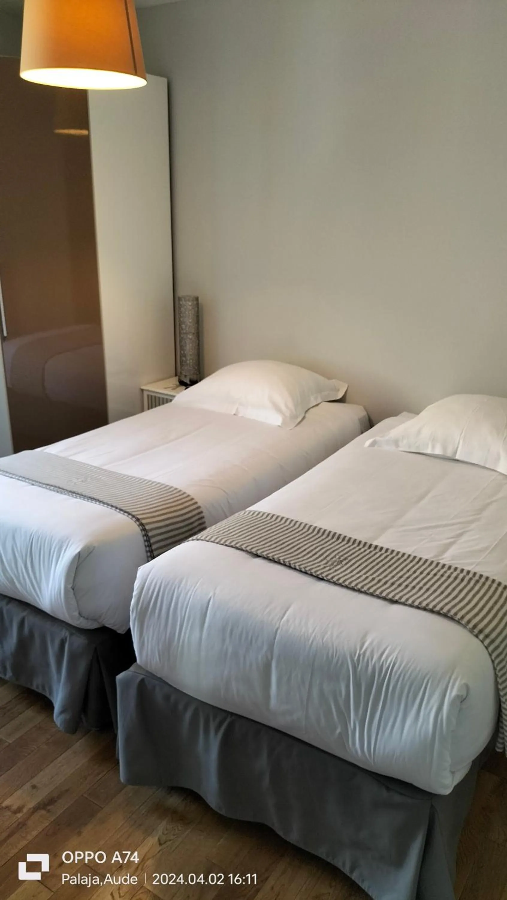 Bed in Logis Hôtel Château De Palaja