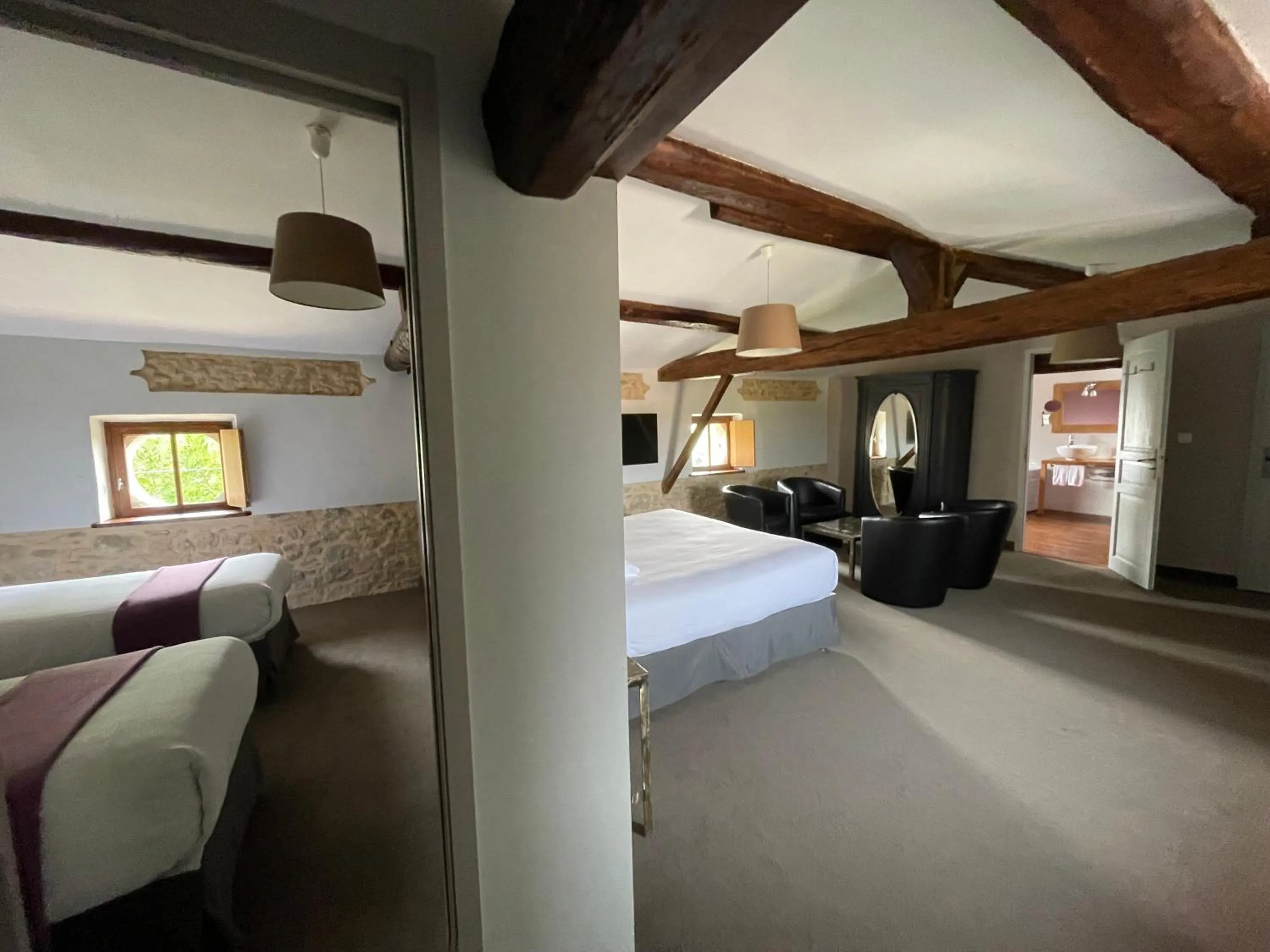 Bed in Logis Hôtel Château De Palaja