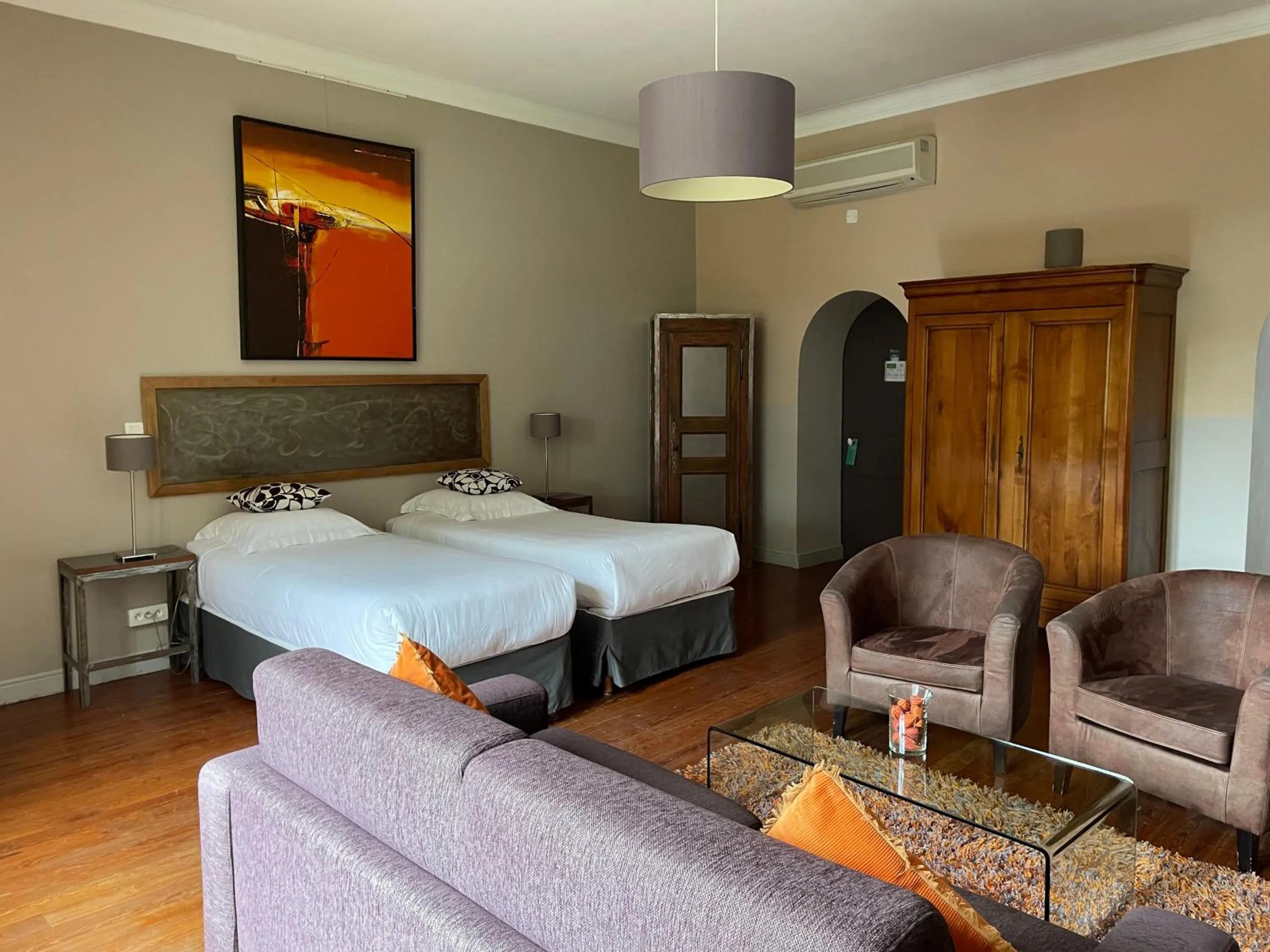 Bed in Logis Hôtel Château De Palaja