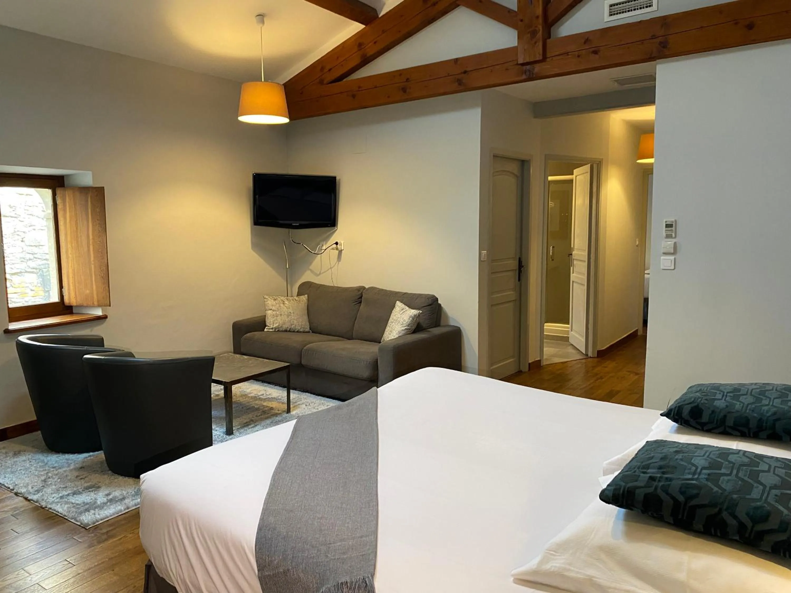 Photo of the whole room, Bed in Logis Hôtel Château De Palaja