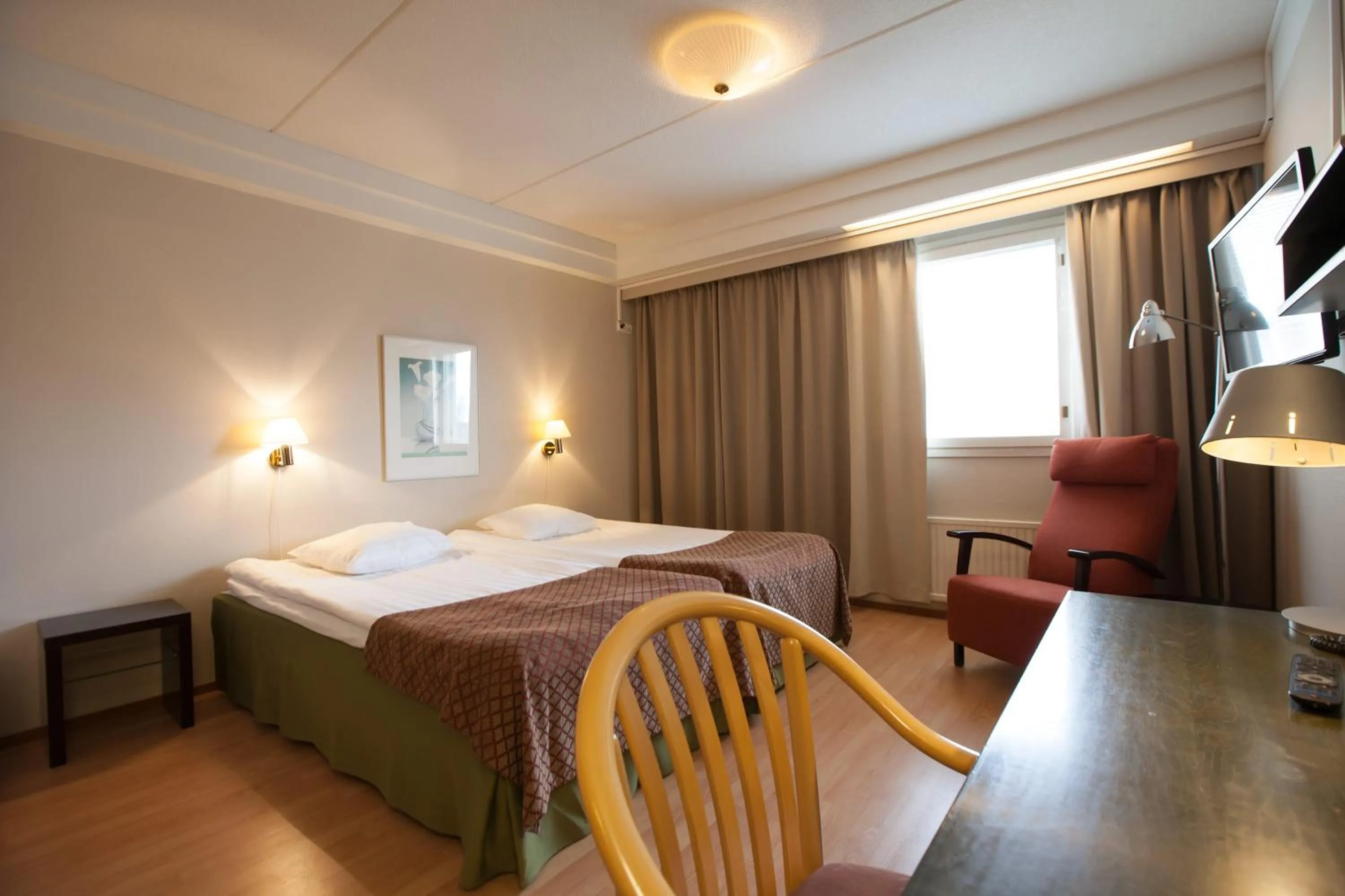 Bed in Hotel Kajanus