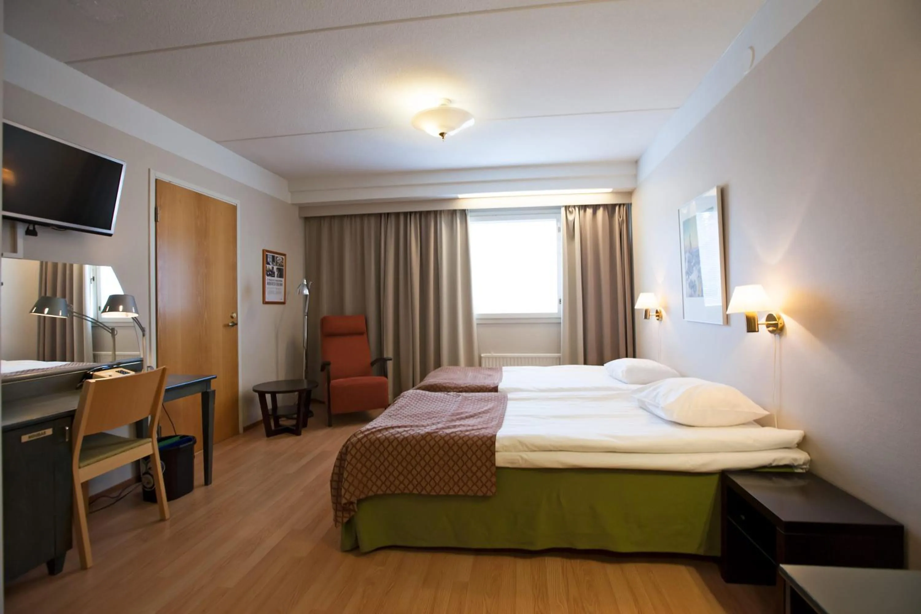 Bed in Hotel Kajanus