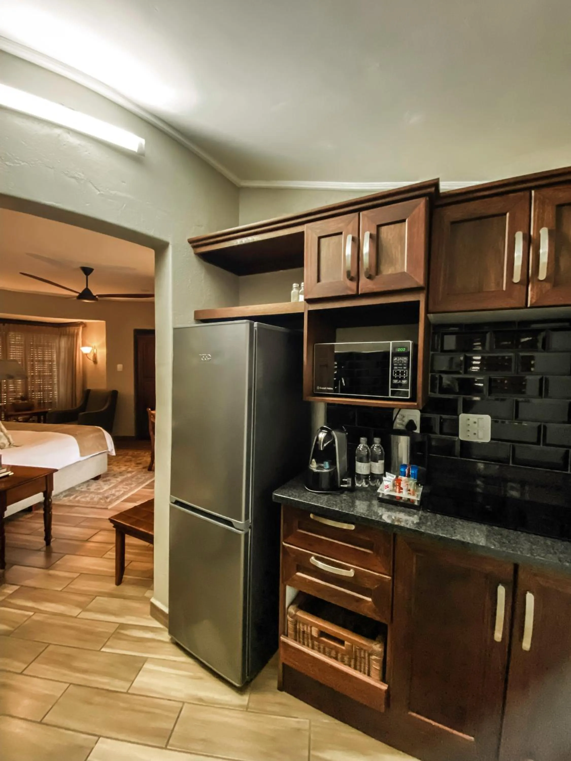 Kitchen or kitchenette, Bed in Fairview Hotels,Spa & Golf Resort