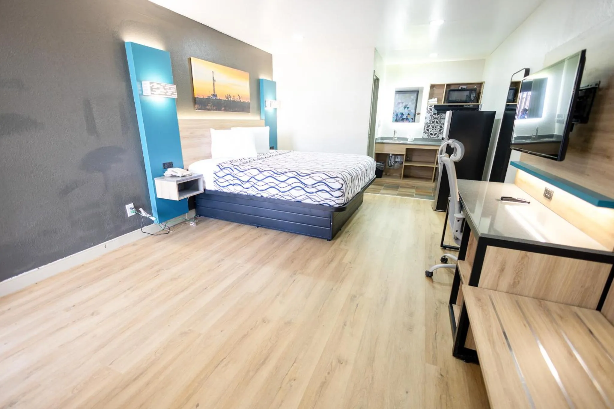 Bed in West Texas Inn & Suites with Kitchenette