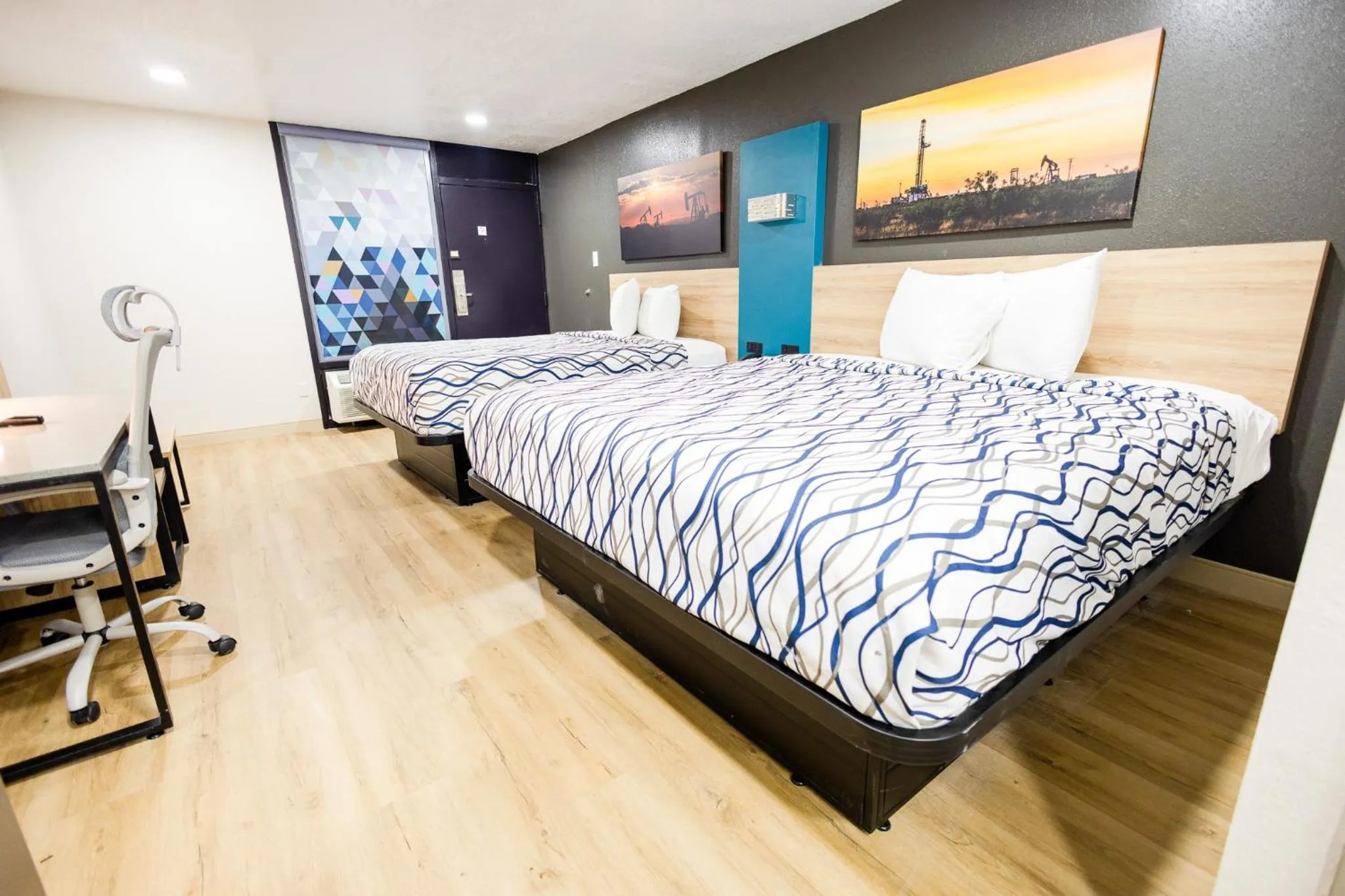 Bed in West Texas Inn & Suites with Kitchenette