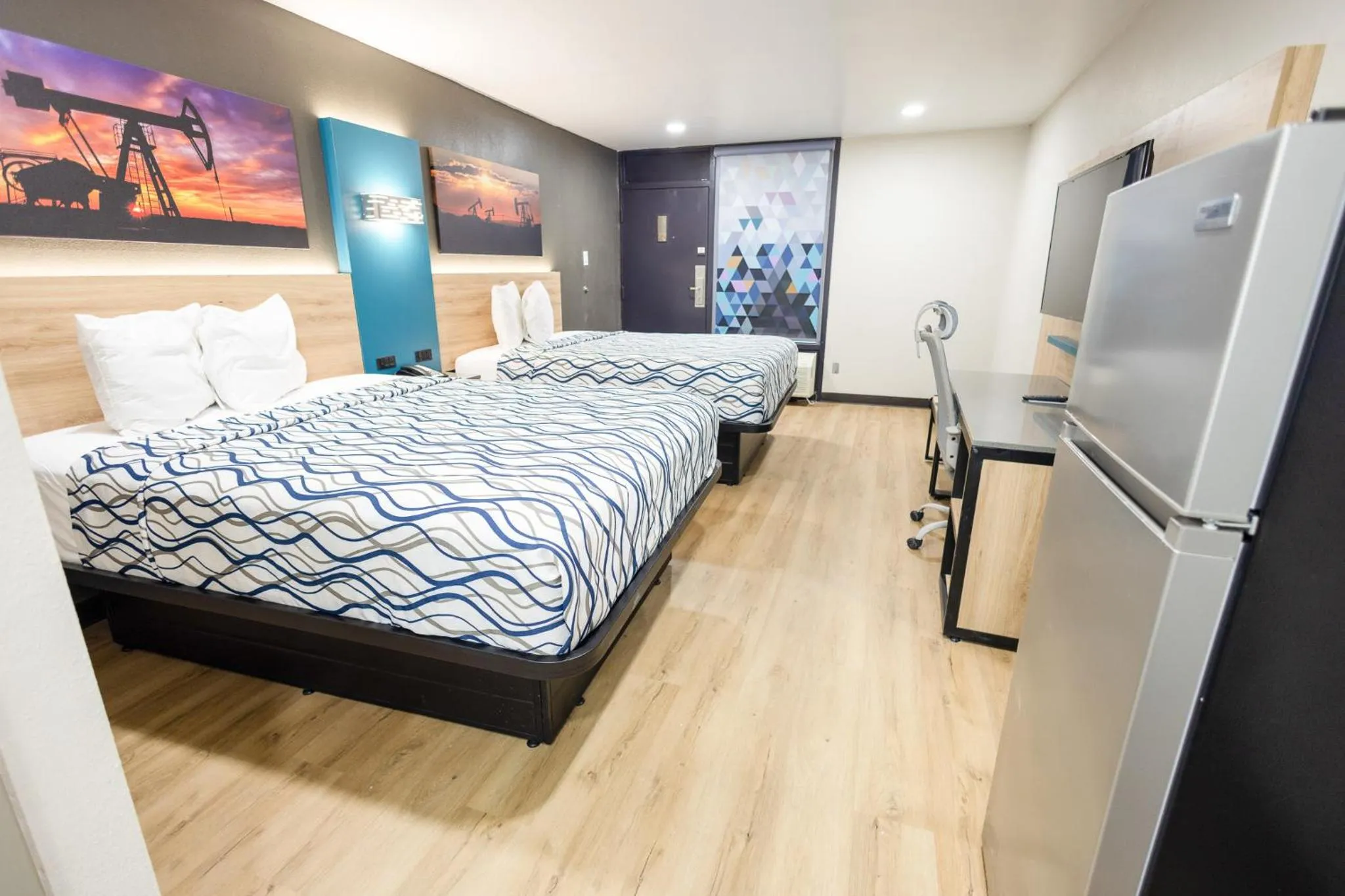 Bed in West Texas Inn & Suites with Kitchenette