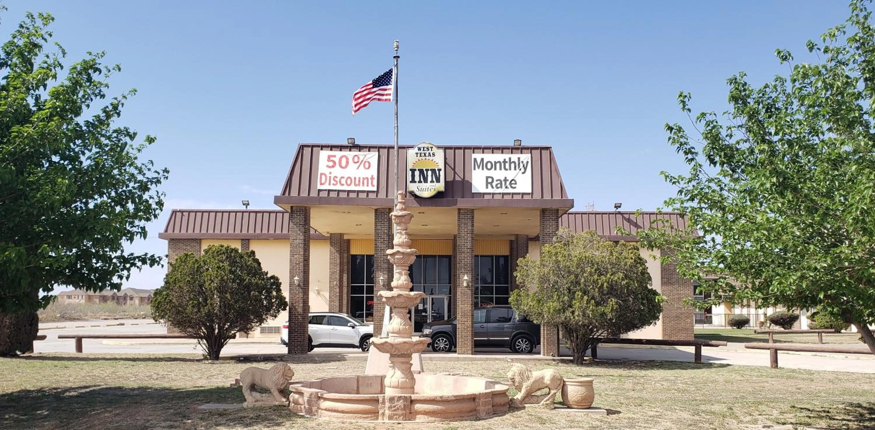 Property building in West Texas Inn & Suites with Kitchenette