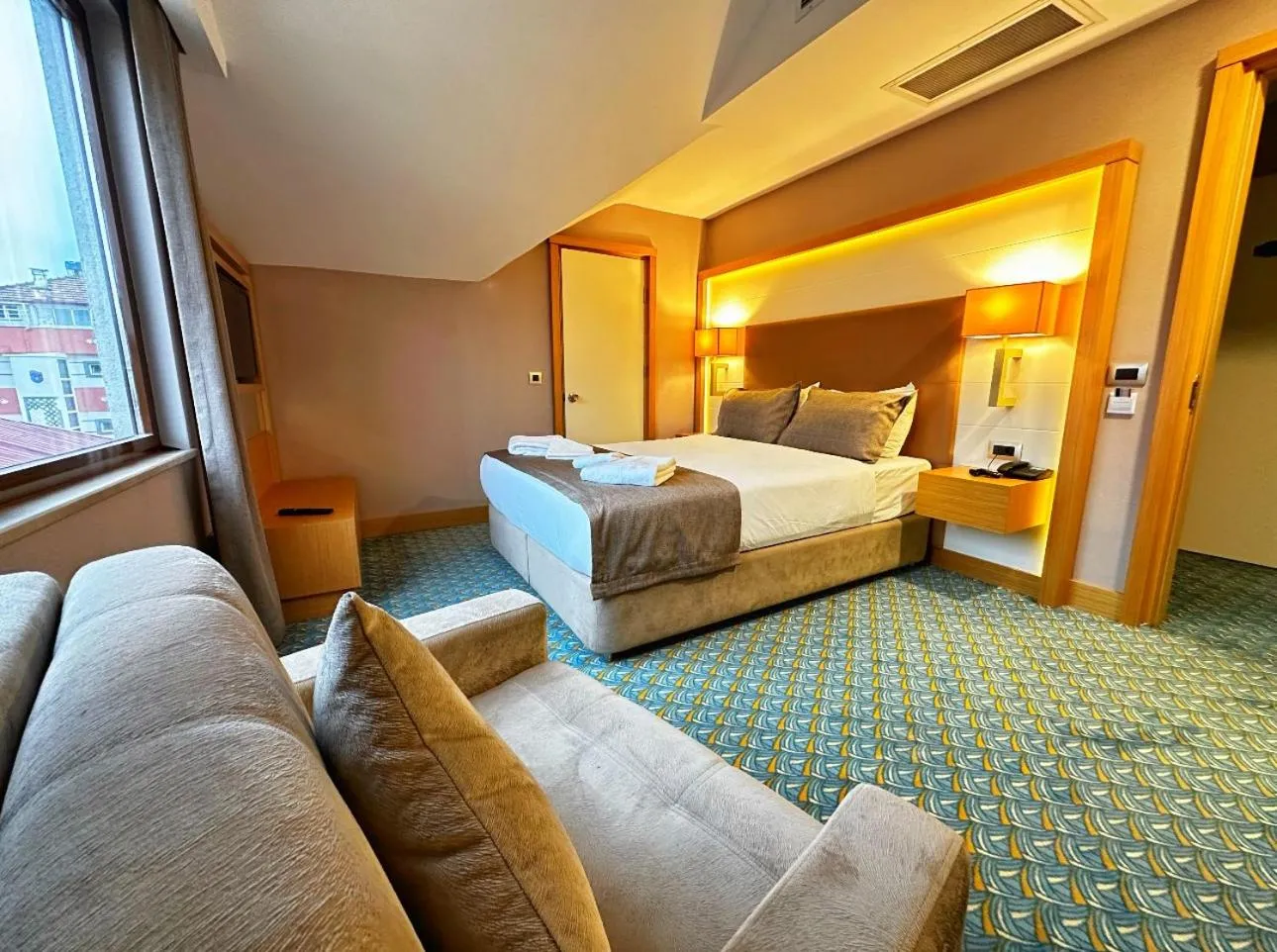 Bed in Blue Sea Hotel