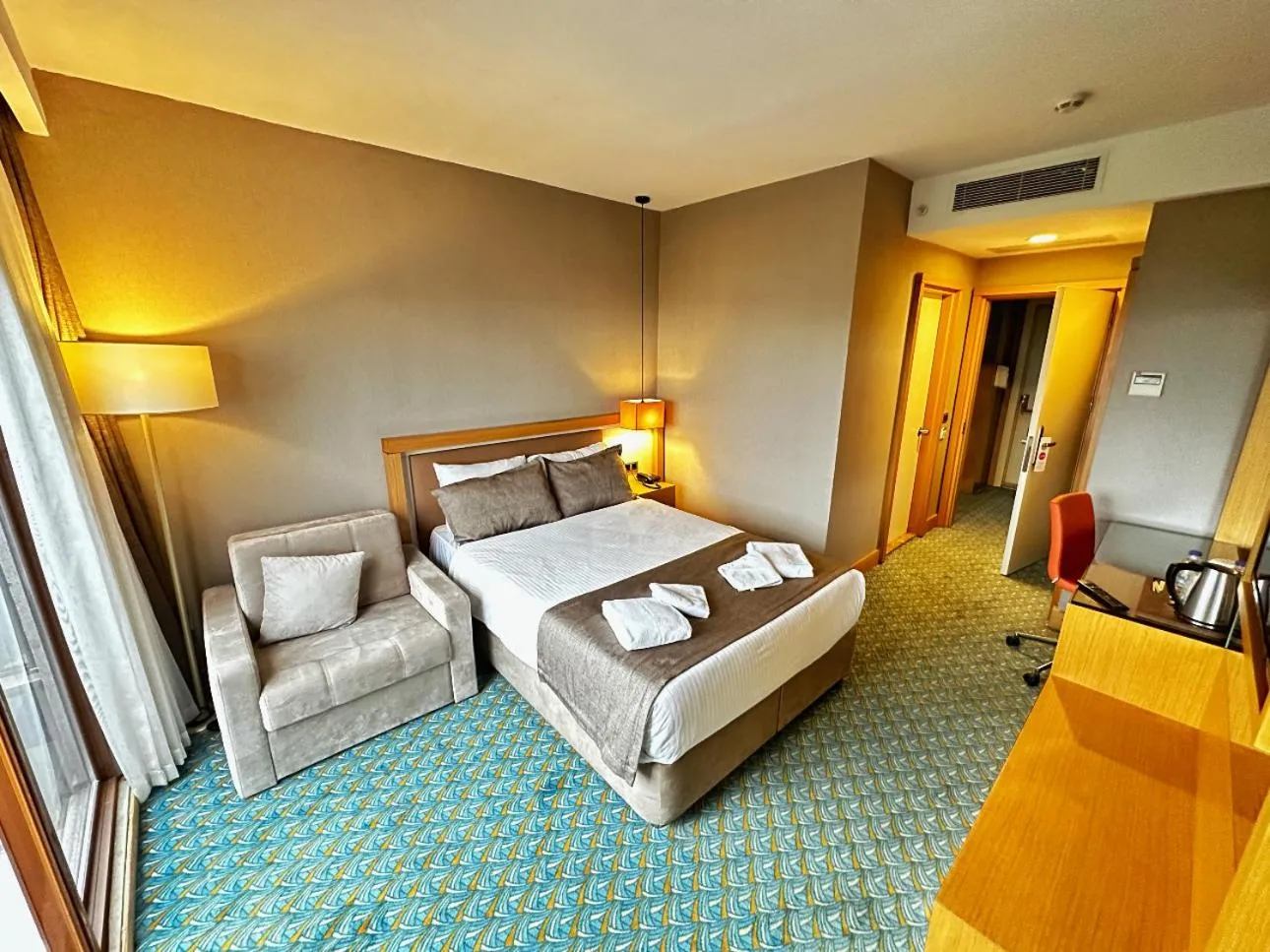 Bed in Blue Sea Hotel