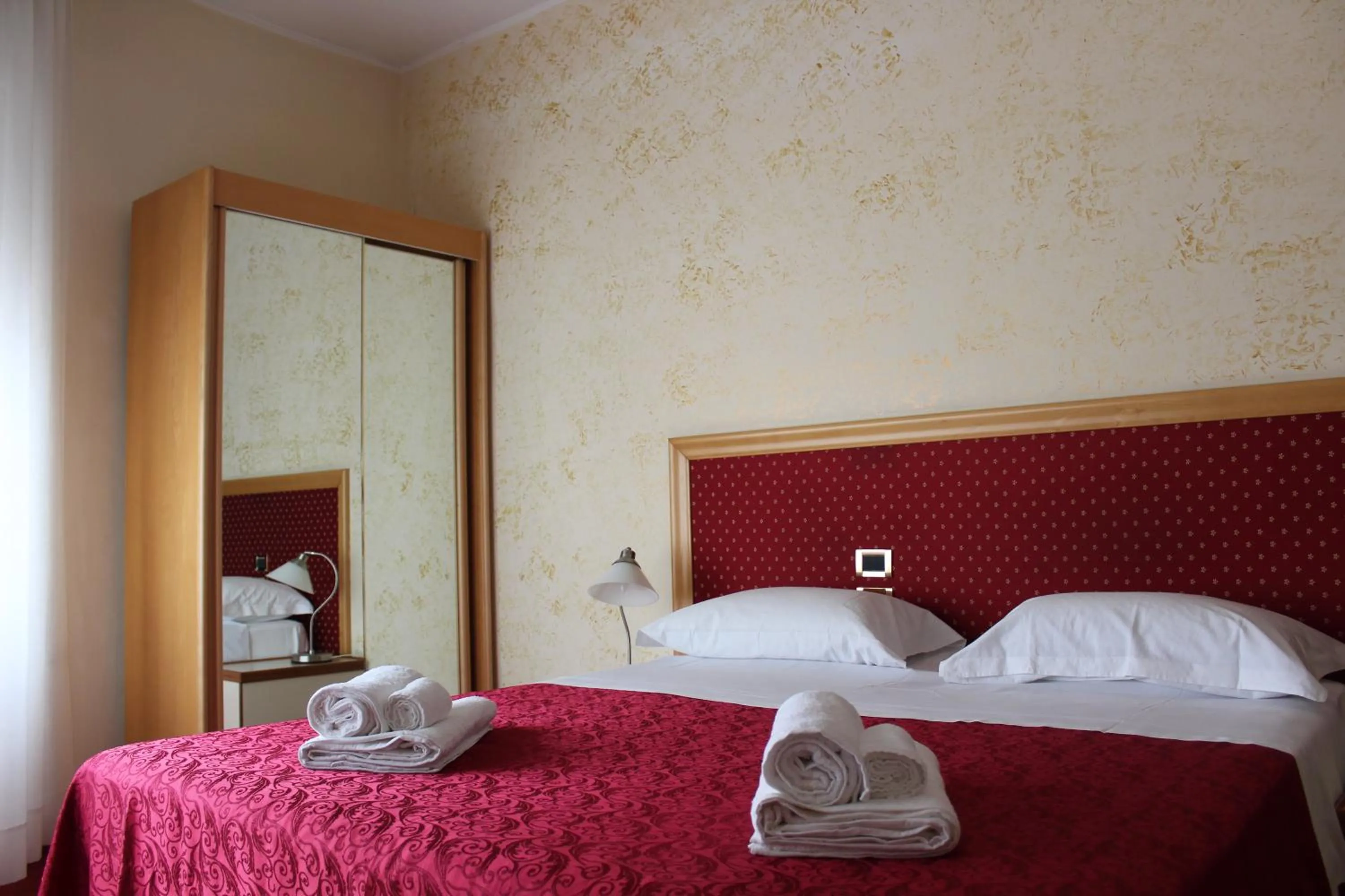 Bed in Hotel Palace Masoanri's