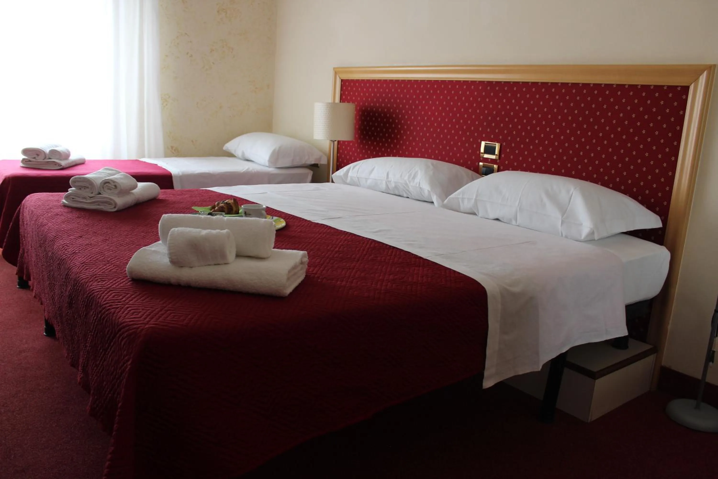 Bed in Hotel Palace Masoanri's