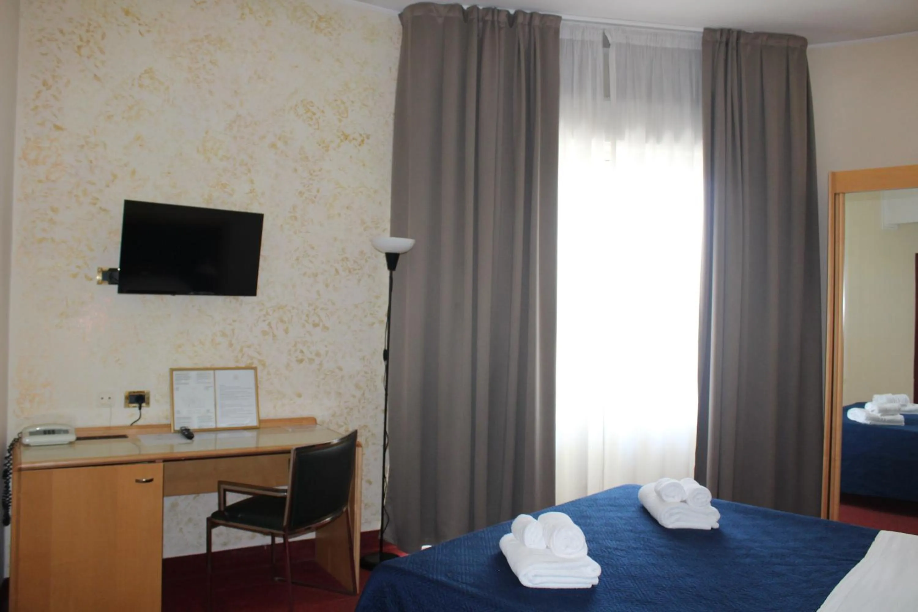 Bed in Hotel Palace Masoanri's