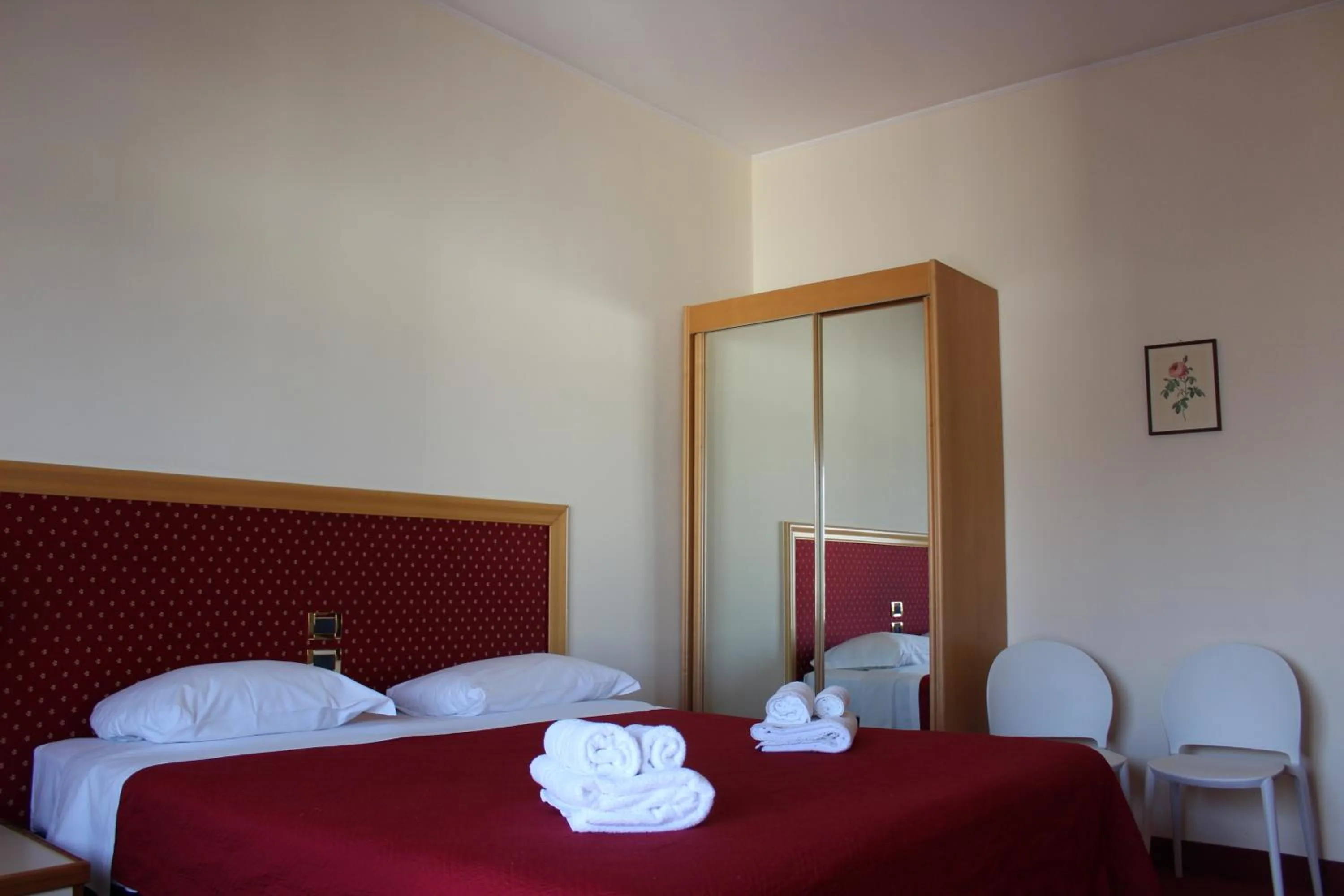 Bed in Hotel Palace Masoanri's