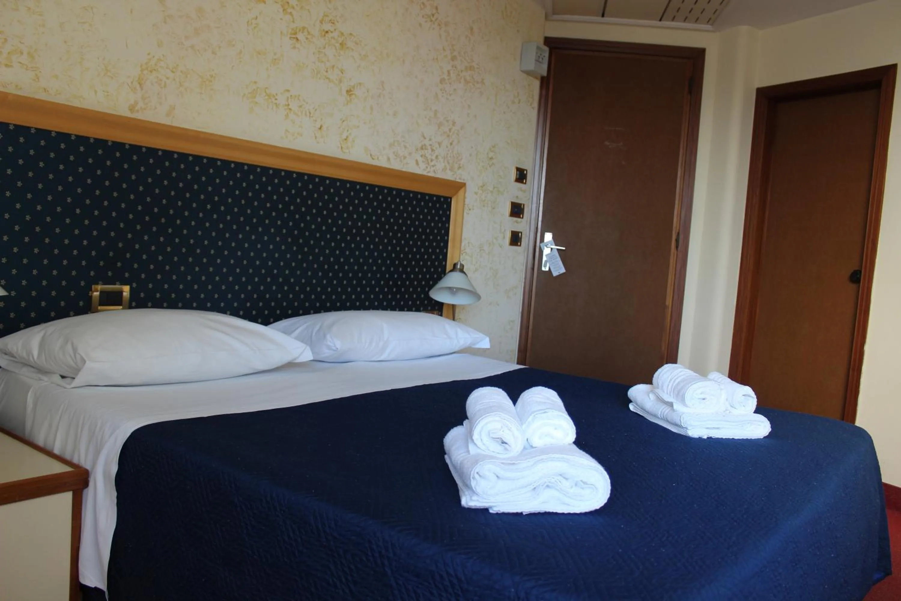 Bed in Hotel Palace Masoanri's