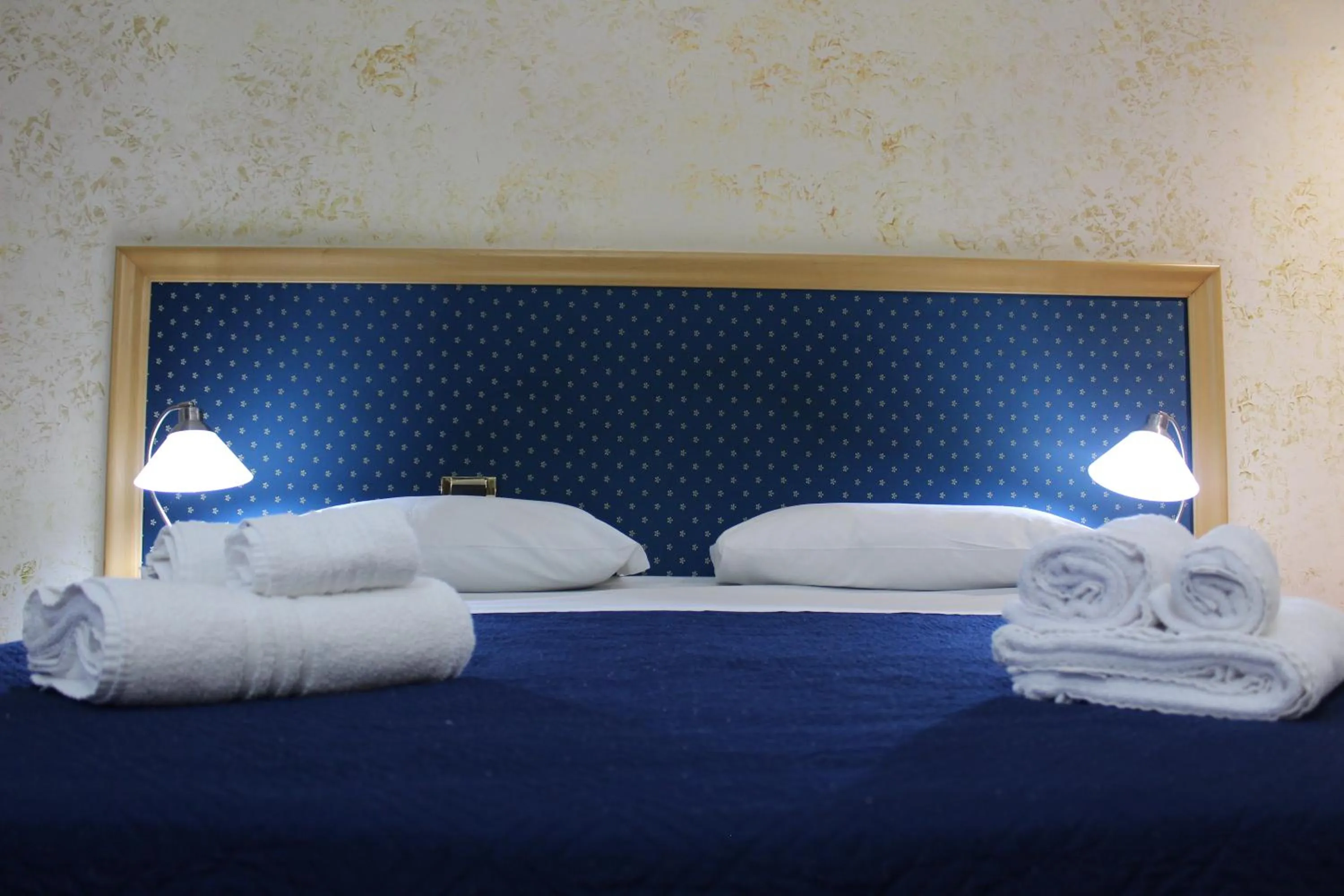 Bed in Hotel Palace Masoanri's