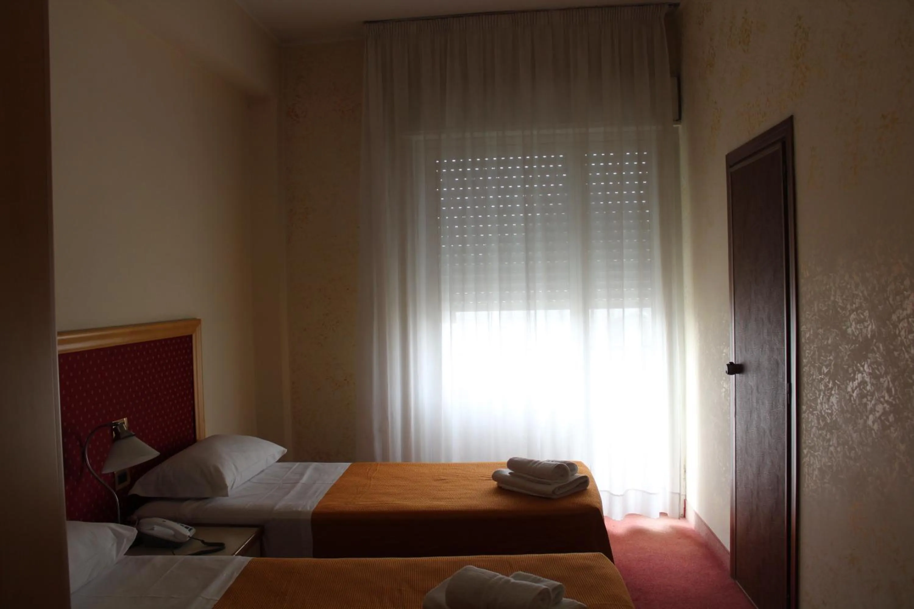 Bed in Hotel Palace Masoanri's