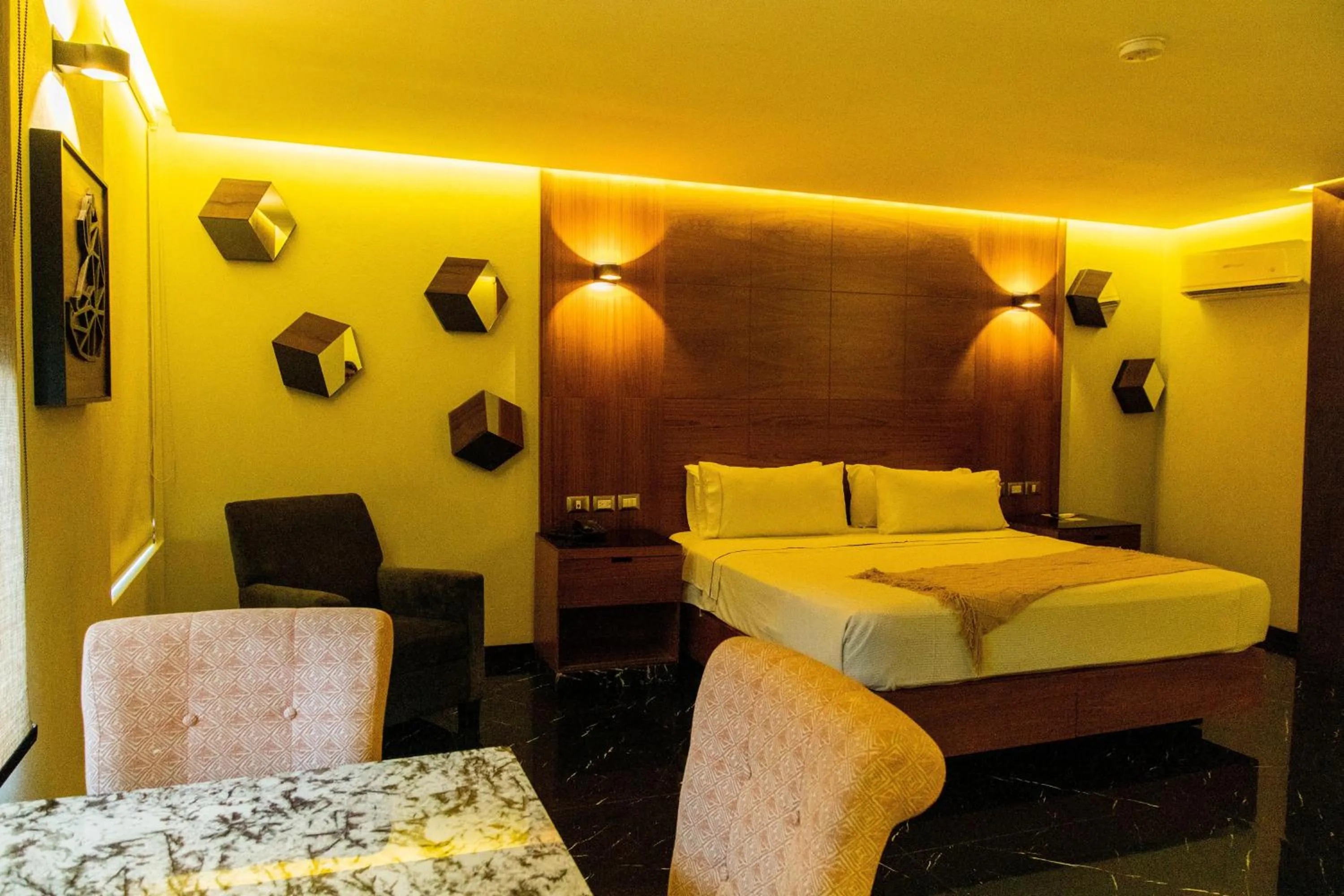 Decorative detail, Bed in Hotel Dali Plaza Ejecutivo