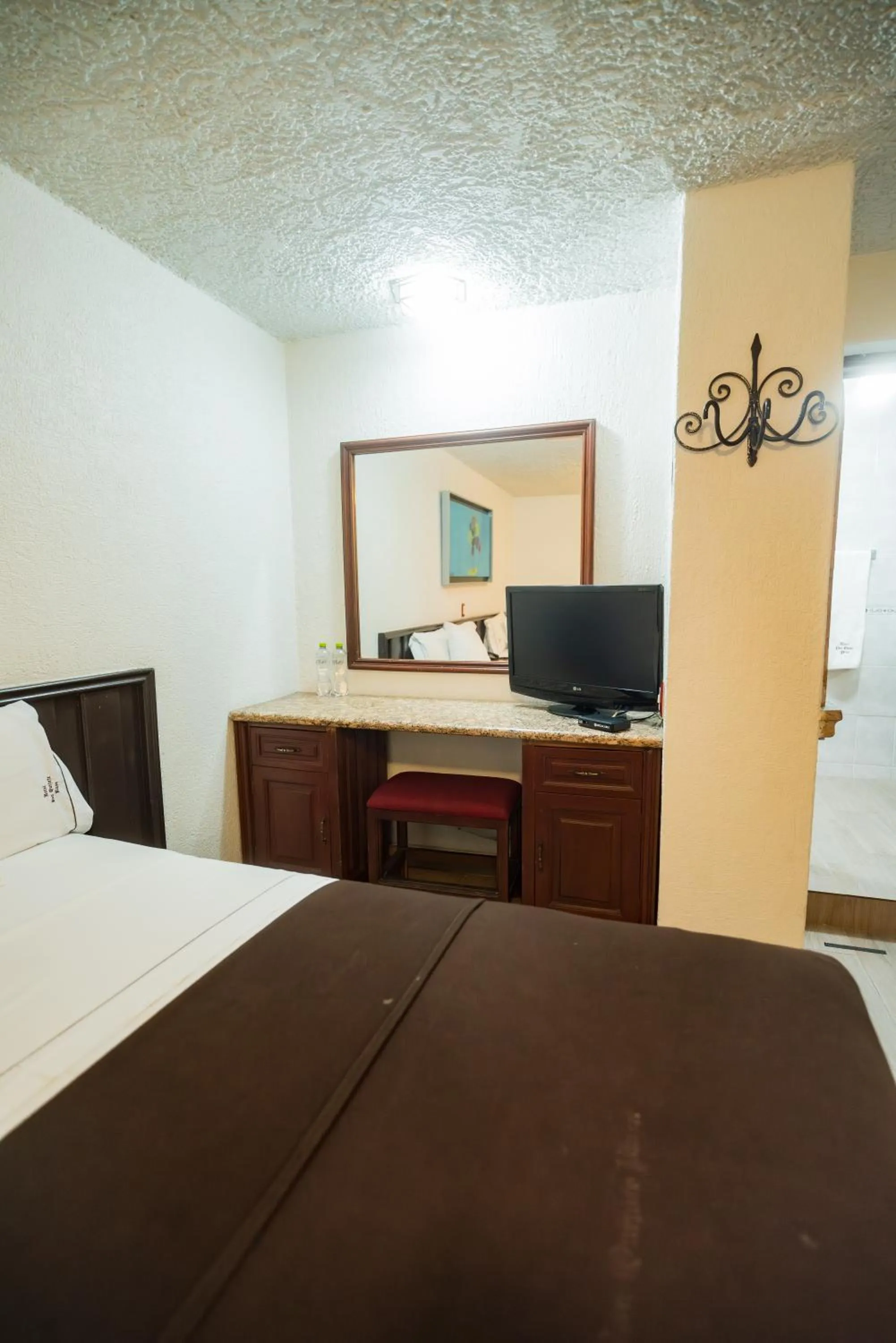 Bed in Hotel Don Quijote Plaza - Guadalajara Centro Historico