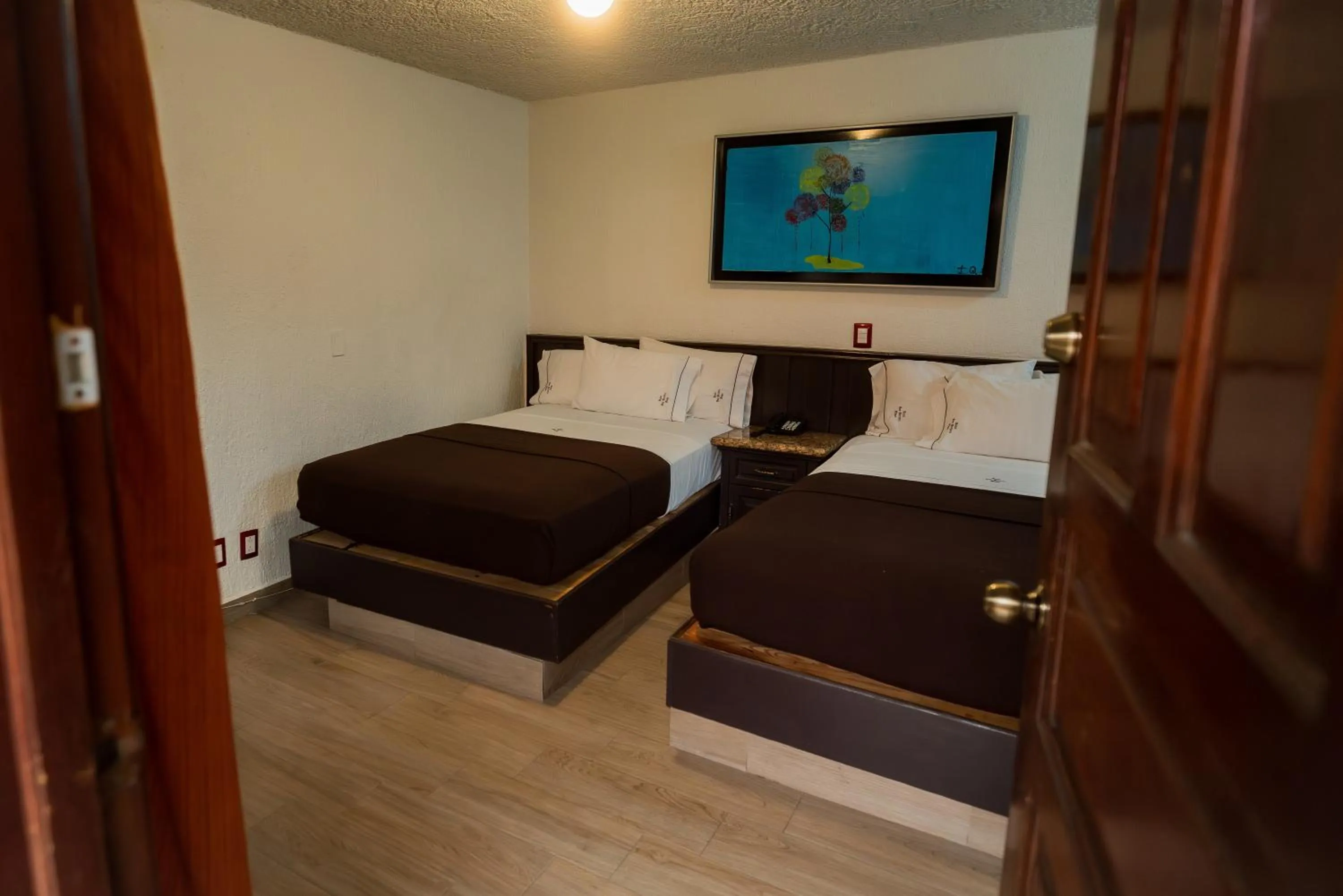 Bed in Hotel Don Quijote Plaza - Guadalajara Centro Historico