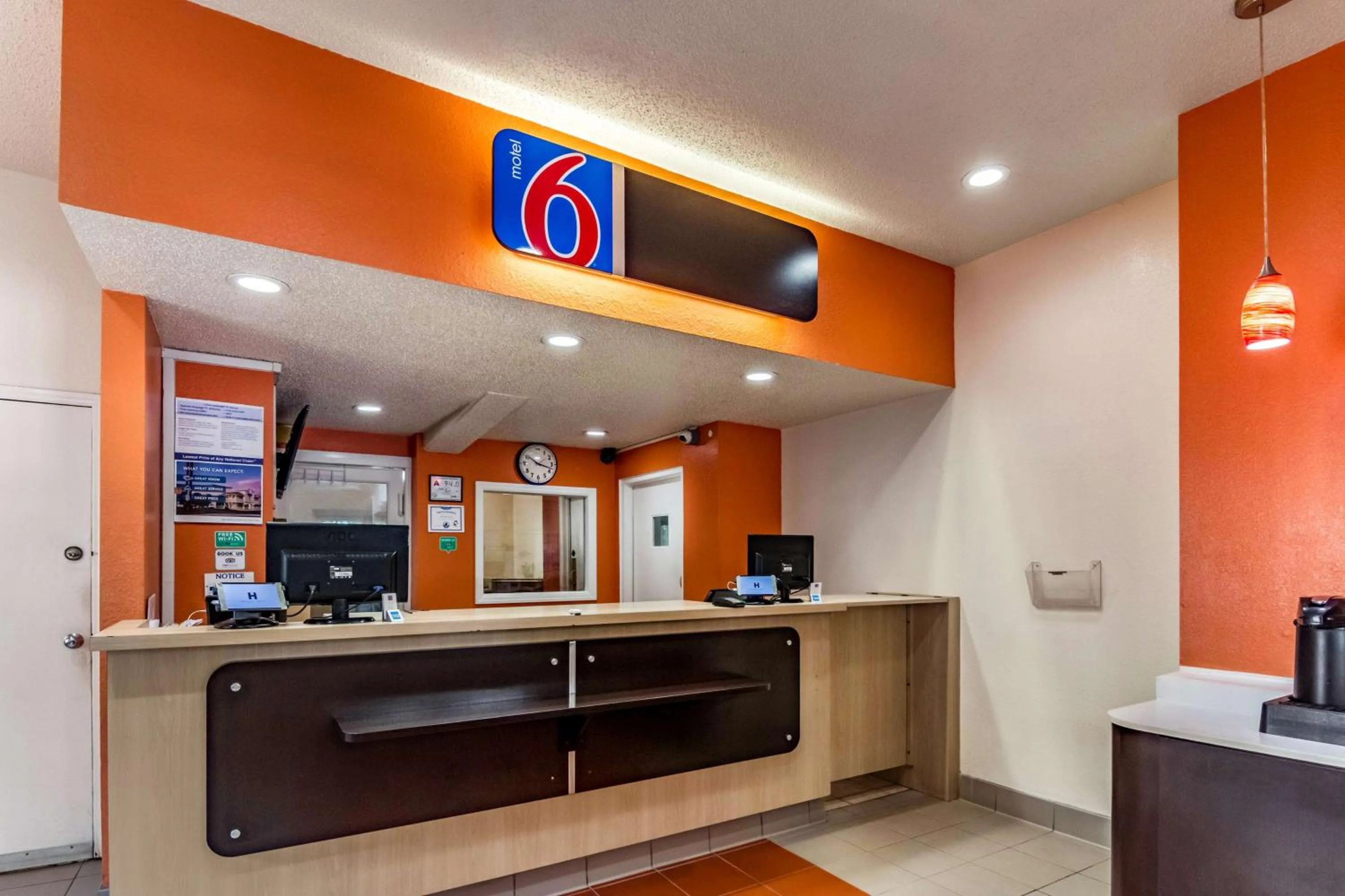 Property logo or sign in Motel 6-Raleigh, NC - Cary