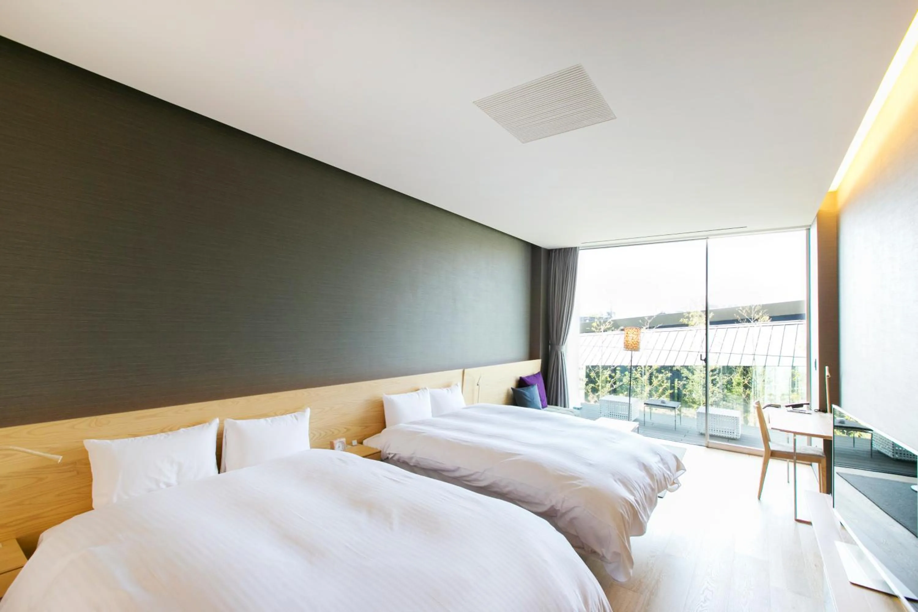 Photo of the whole room, Bed in The Meibia Miyazaki