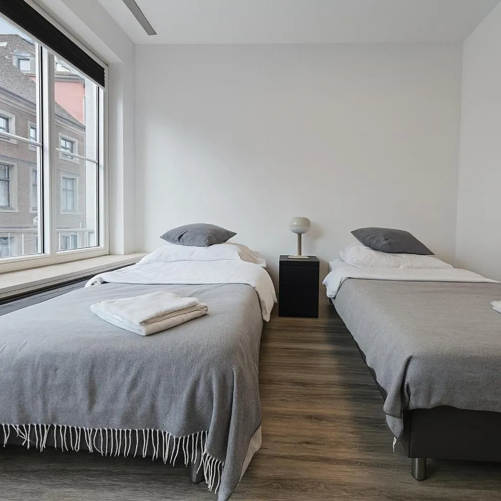 Bed in Old Town Apartments