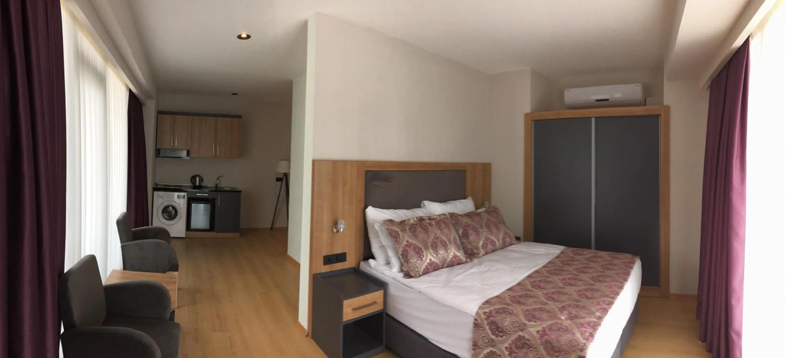 Bedroom, Bed in Euphoria Apartments