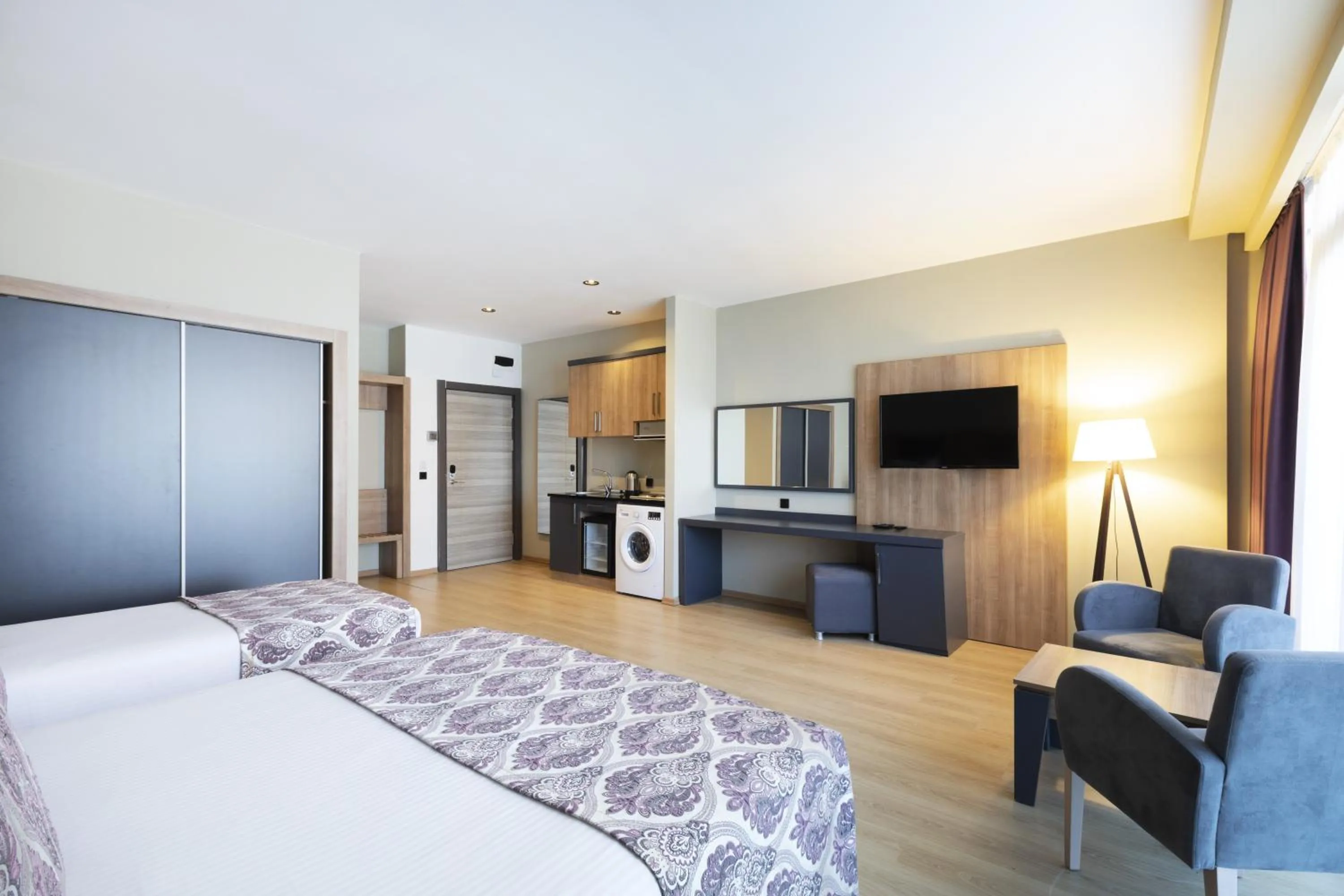 Photo of the whole room, Bed in Euphoria Apartments